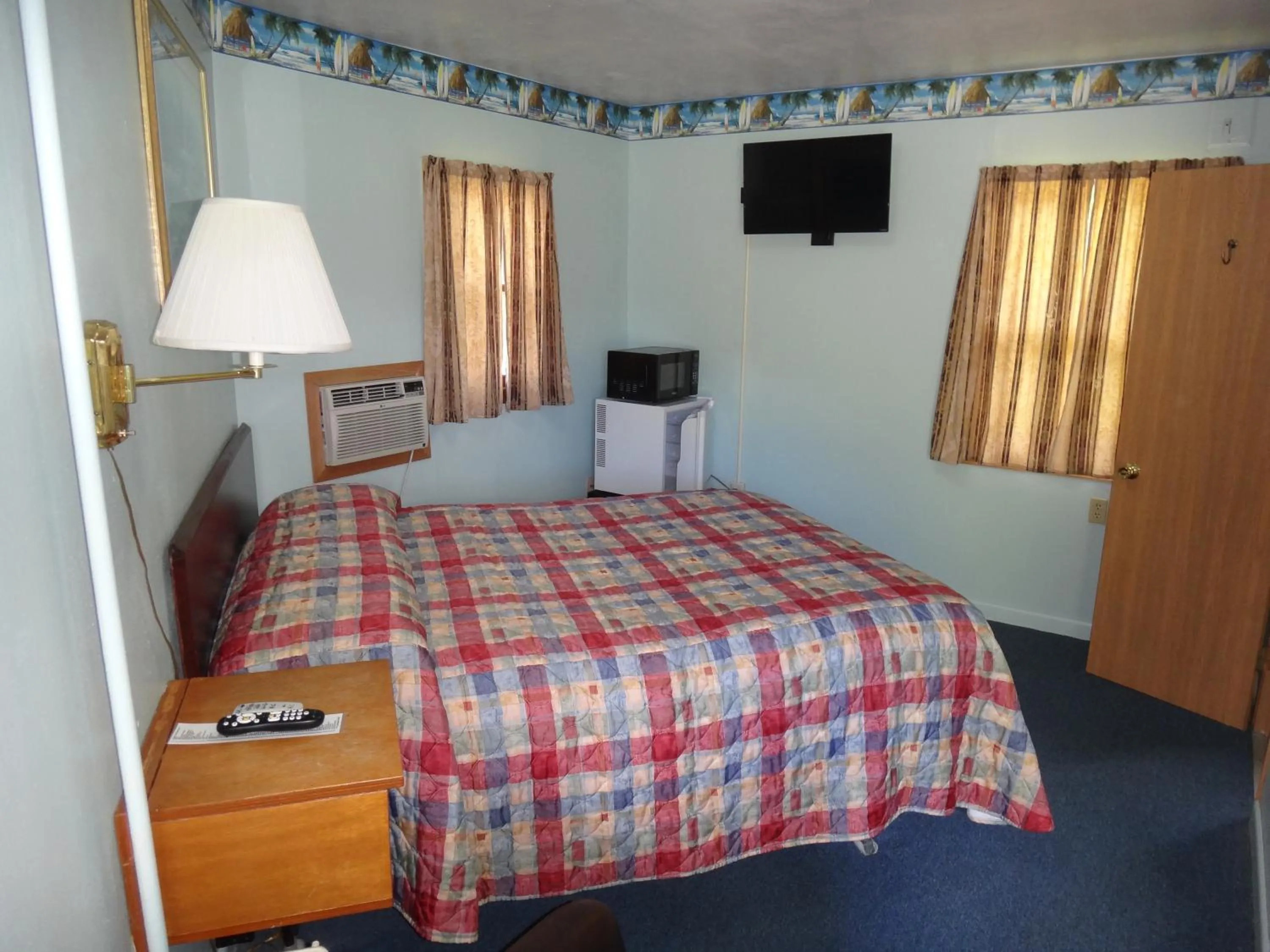 Bed in Pine Ridge Motel