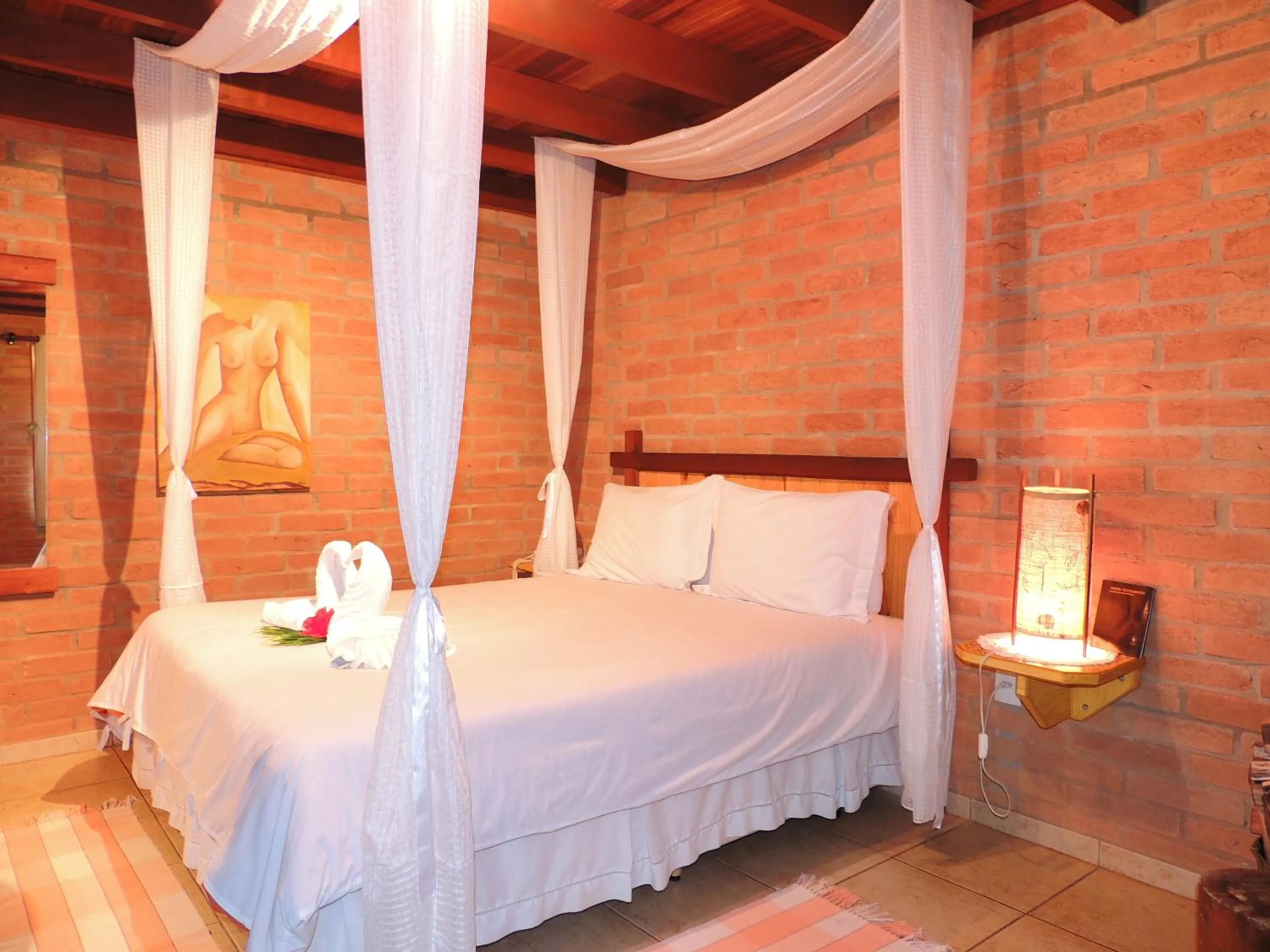 Bed in Pousada Cantinho das Estrelas