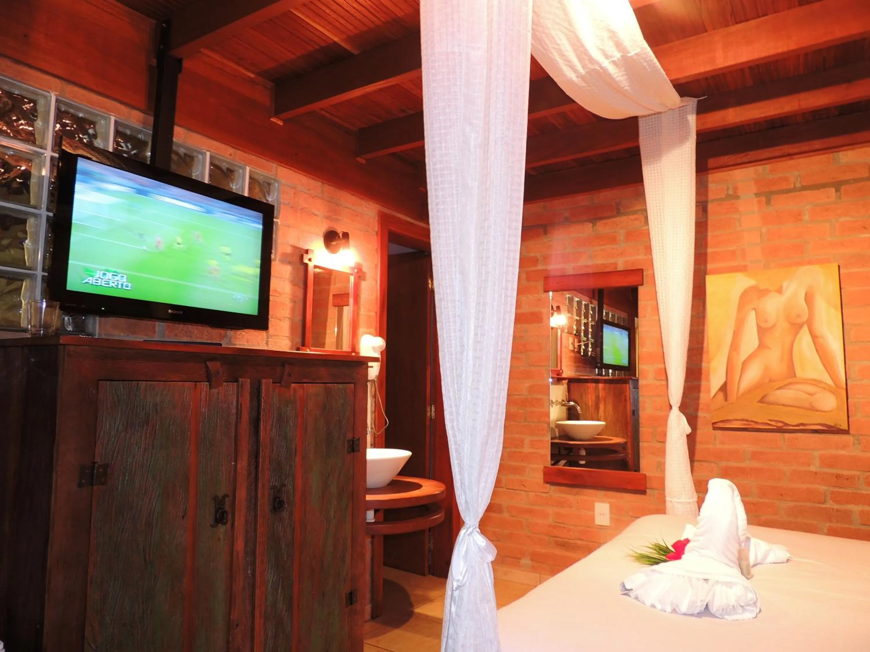 TV and multimedia in Pousada Cantinho das Estrelas