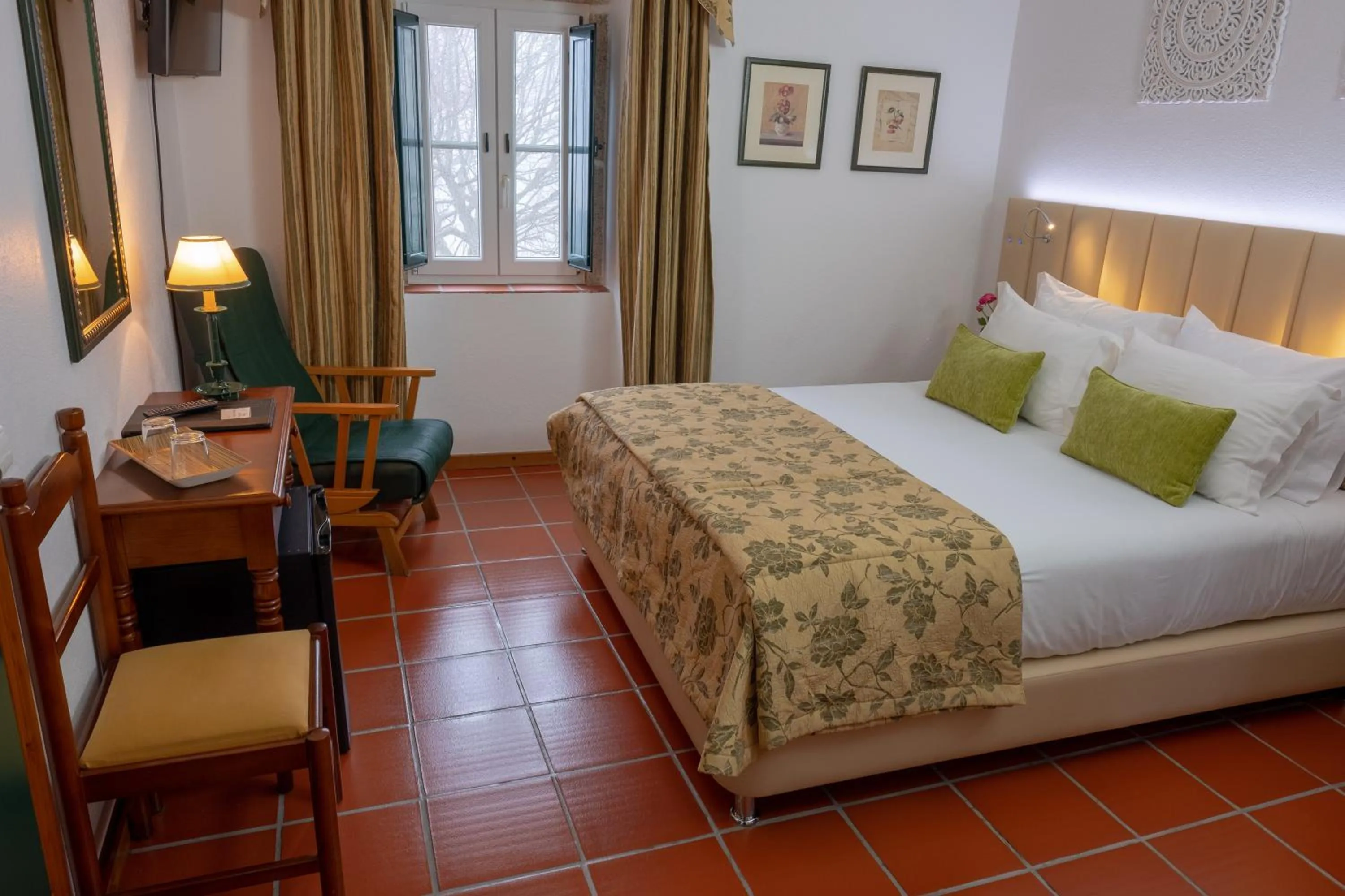 Bed in Hotel El Rei Dom Manuel