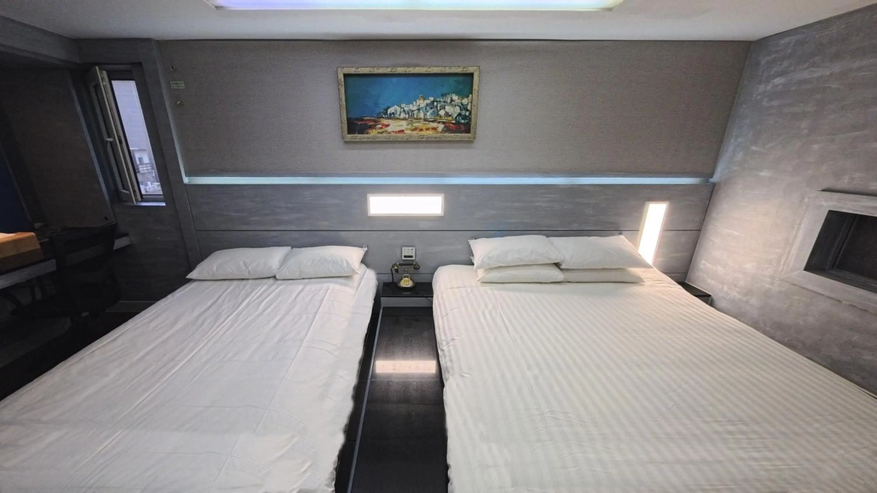 Bed in Friendly DH Naissance Hotel by Mindrum Group