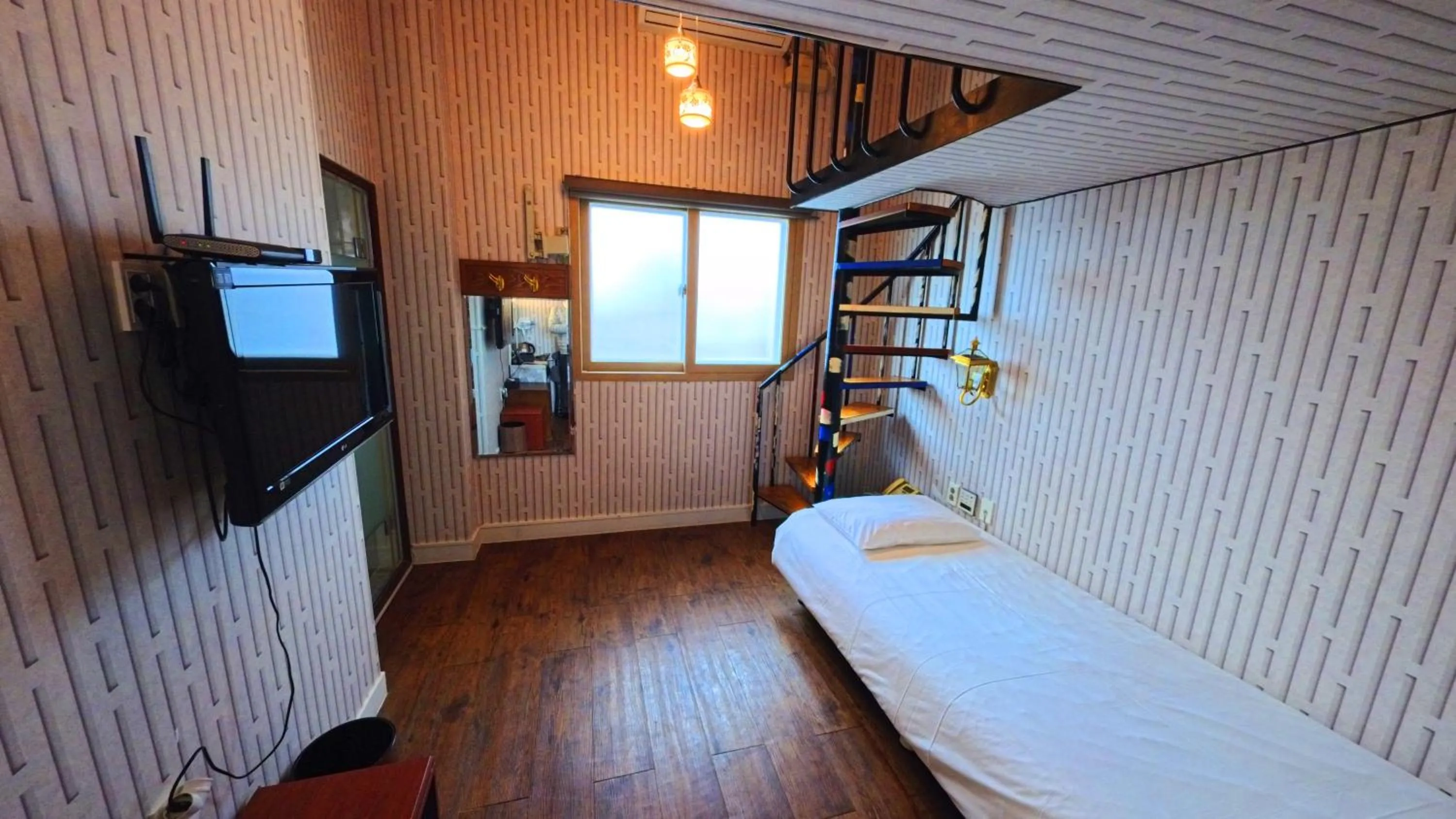 Bed in Friendly DH Naissance Hotel by Mindrum Group