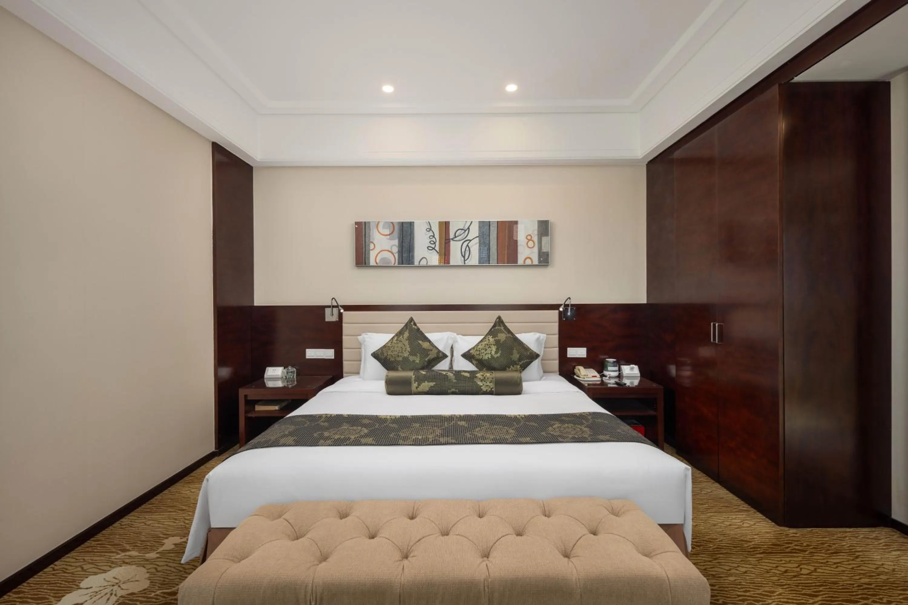 Bed in New Century Hotel Qingdao