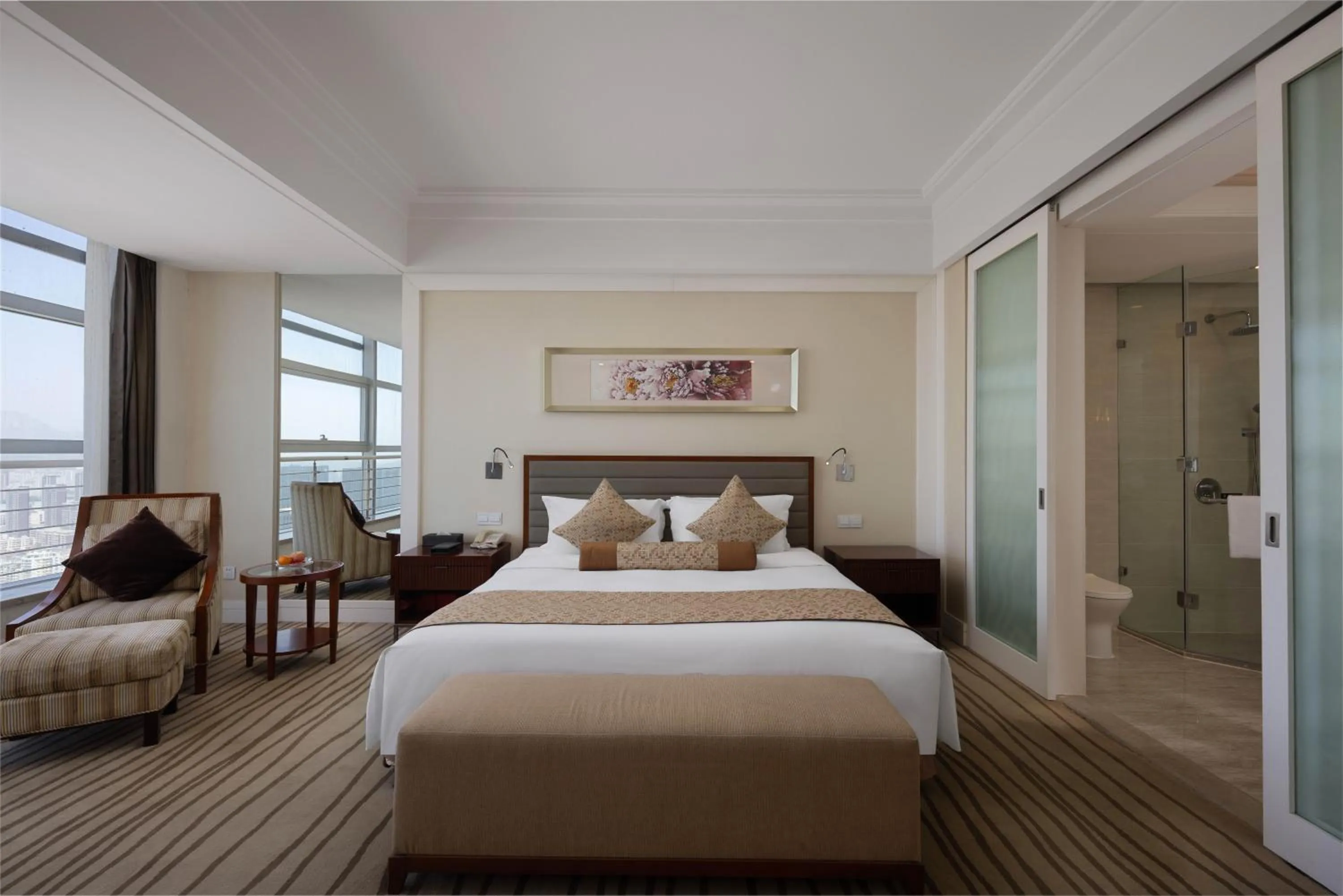 Bed in New Century Hotel Qingdao
