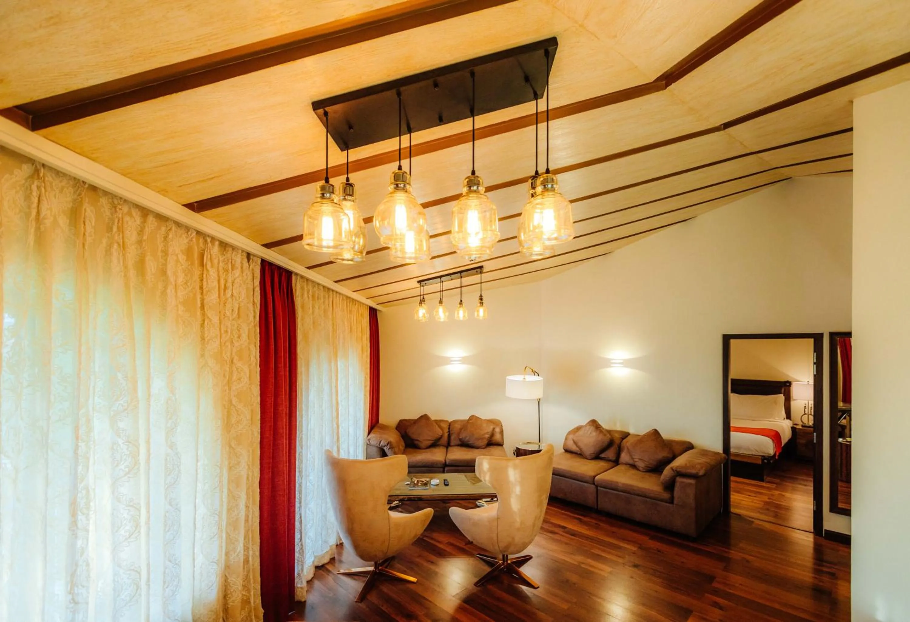 Living room in Holiday Inn Resort Goa by IHG