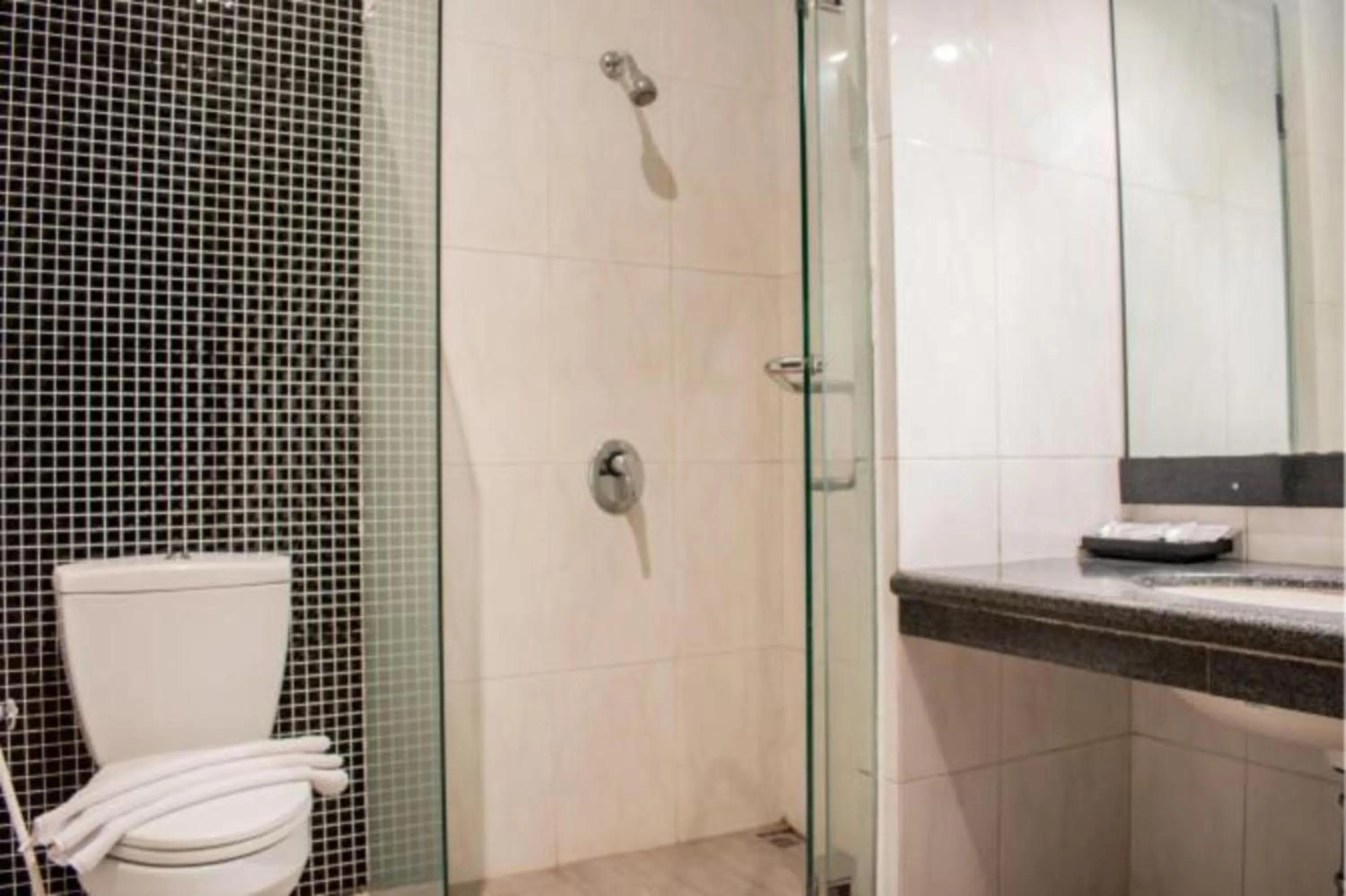 Bathroom in Luminor Hotel Jember By WH