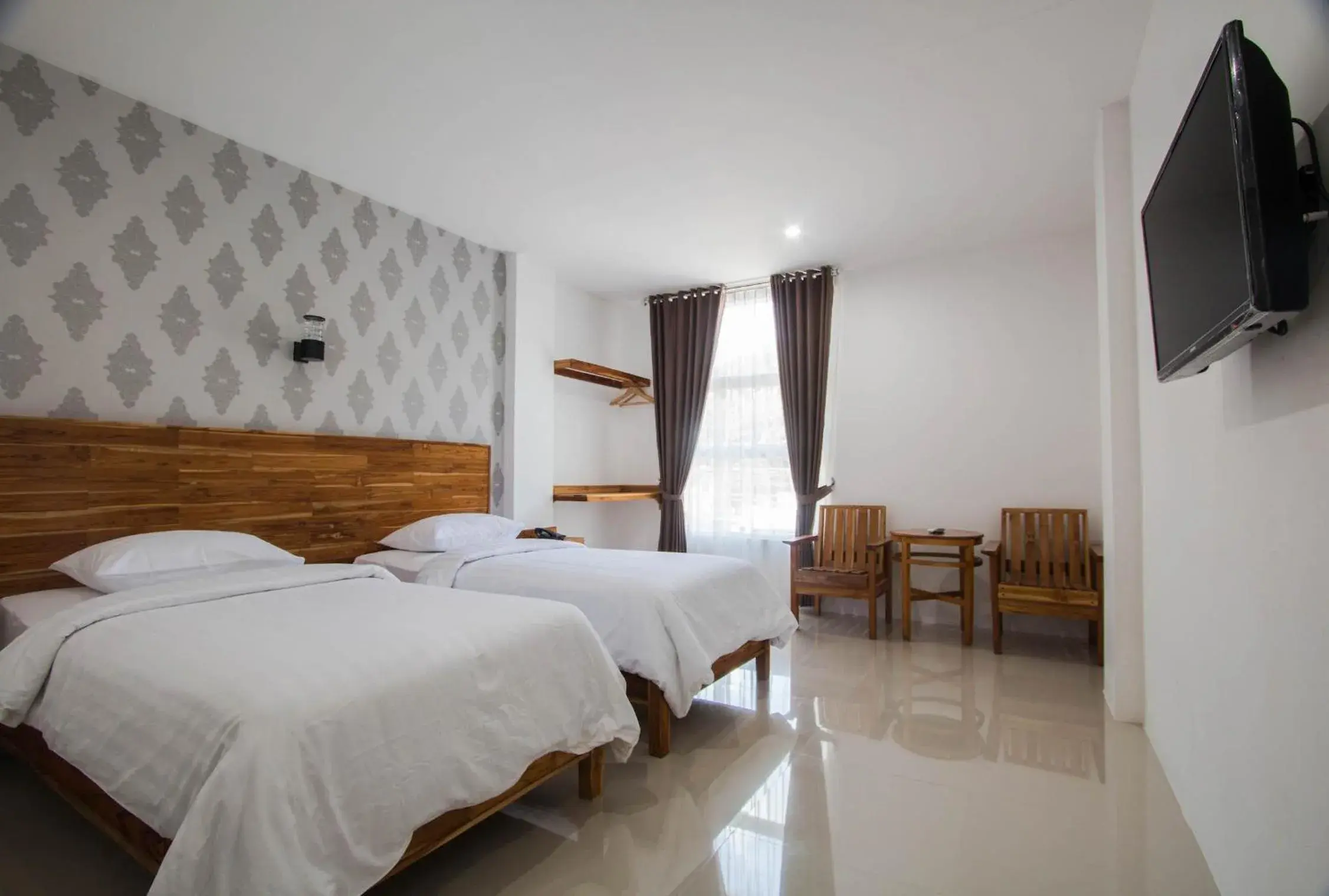 Superior Deluxe Double or Twin Room in Central Inn Senggigi Superior Deluxe Double or Twin Room in Central Inn Senggigi