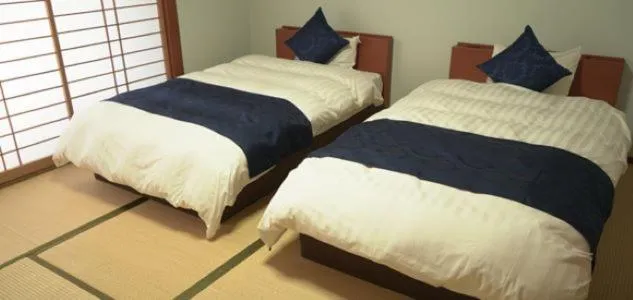 Bed in Kyukamura Ohkunoshima