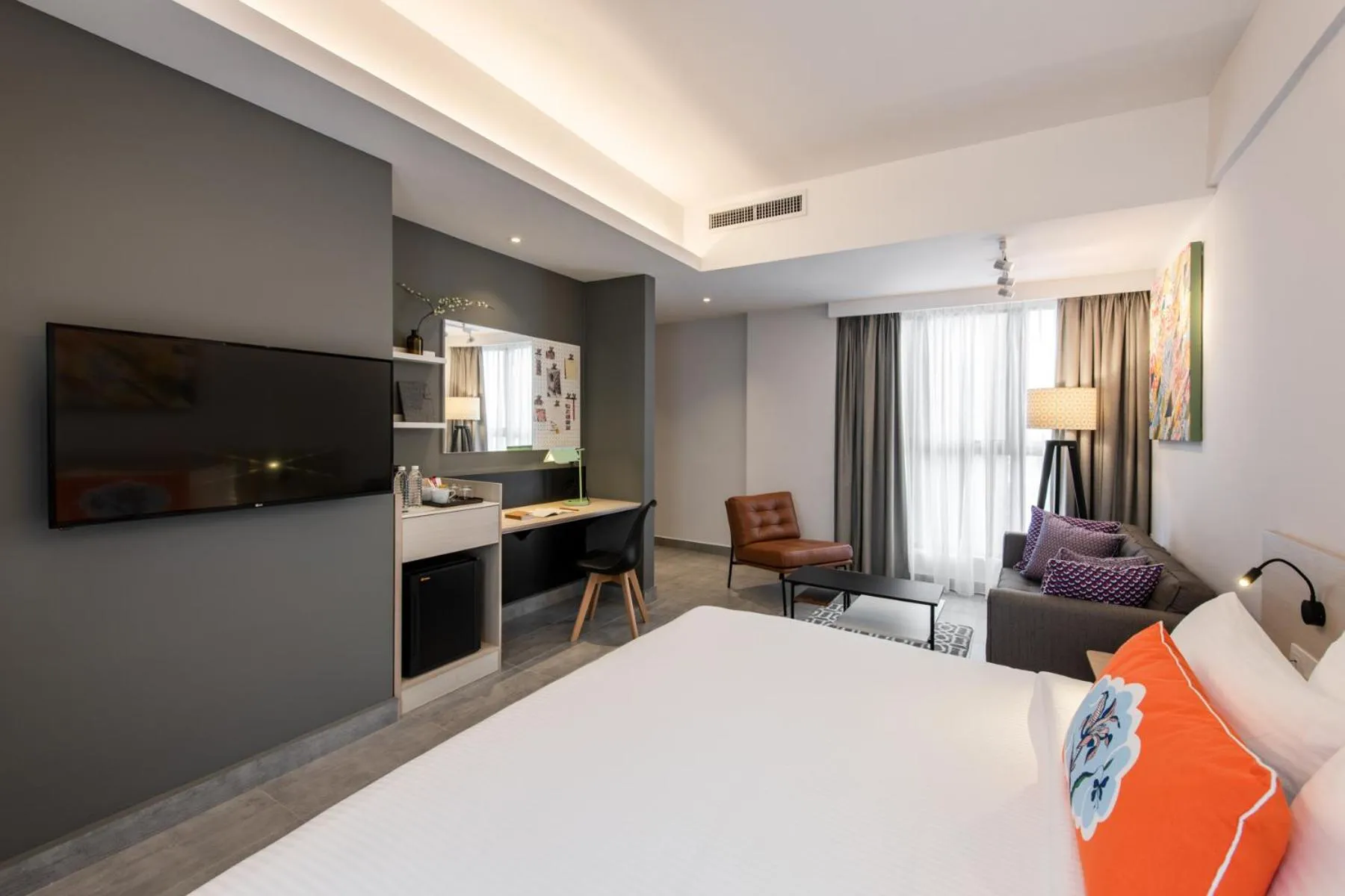 Living room, Bed in The Canvas Hotel