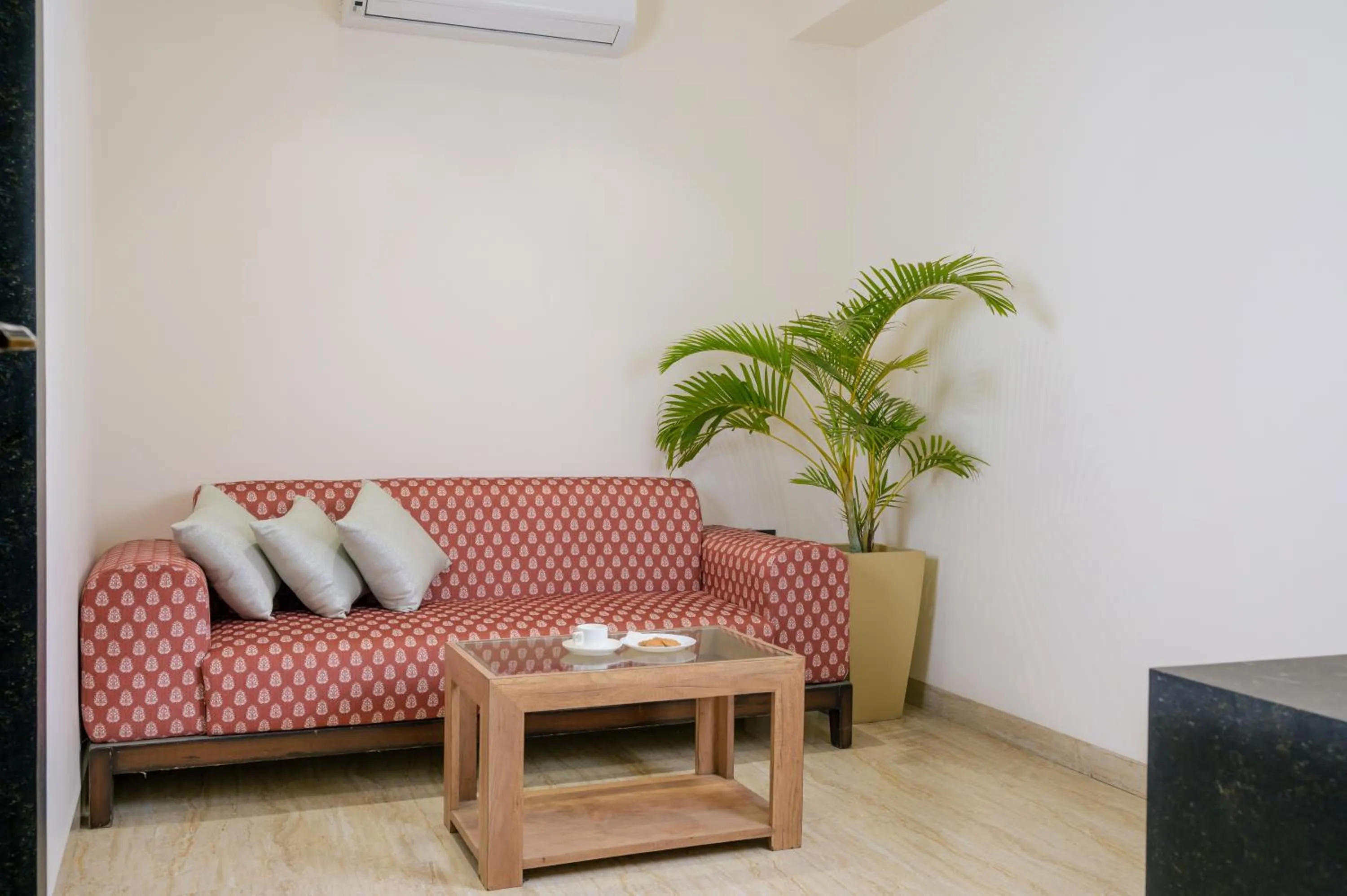 Seating area in The Grand Neelam