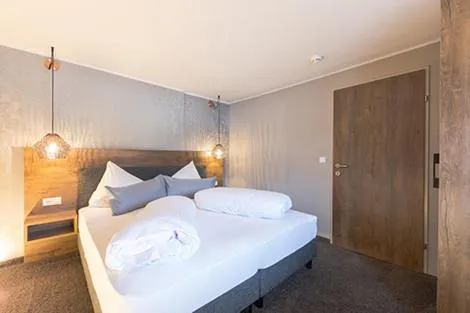 Bedroom, Bed in LakeSide Apartments Seefeld