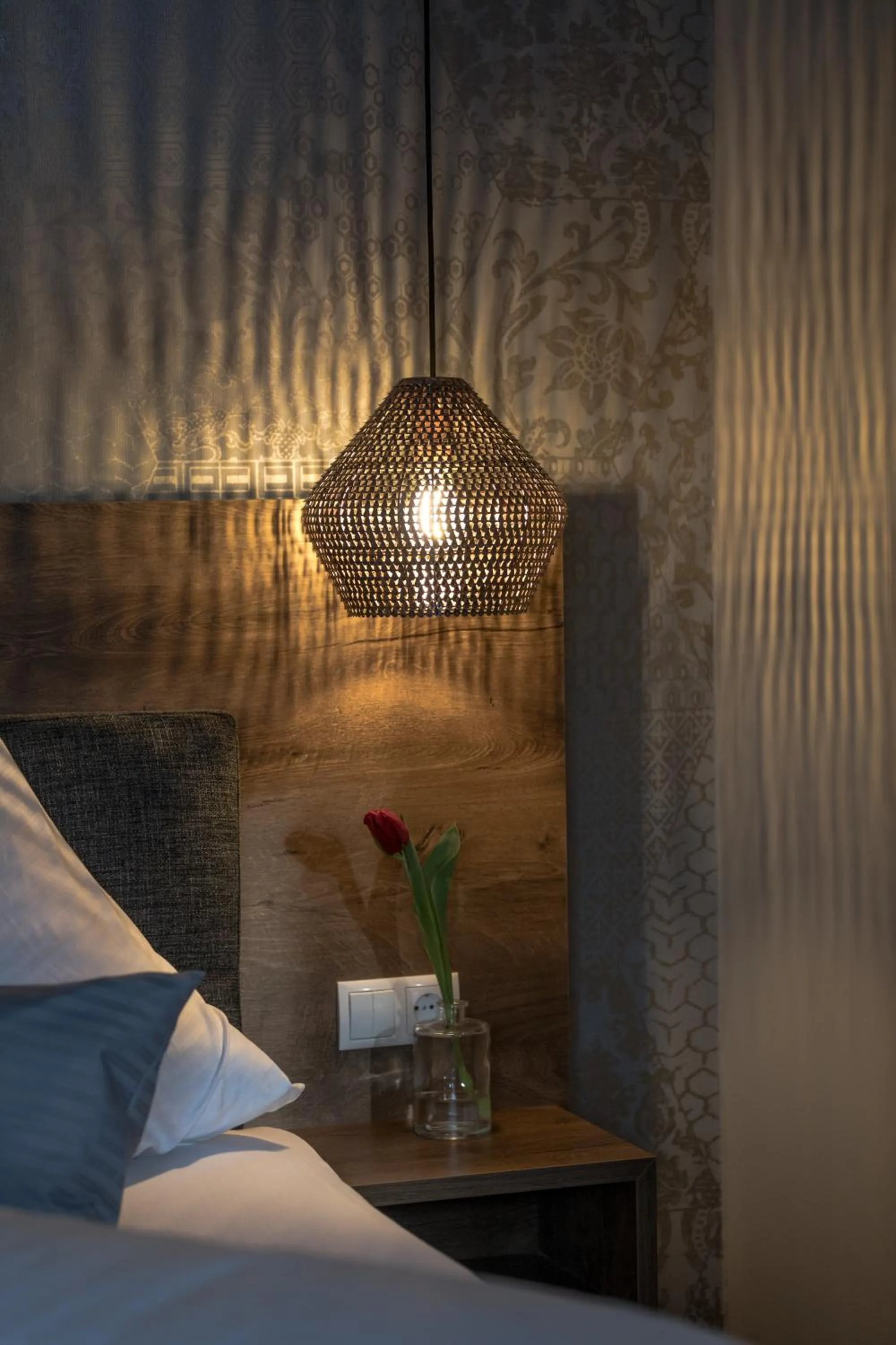 Decorative detail, Bed in LakeSide Apartments Seefeld