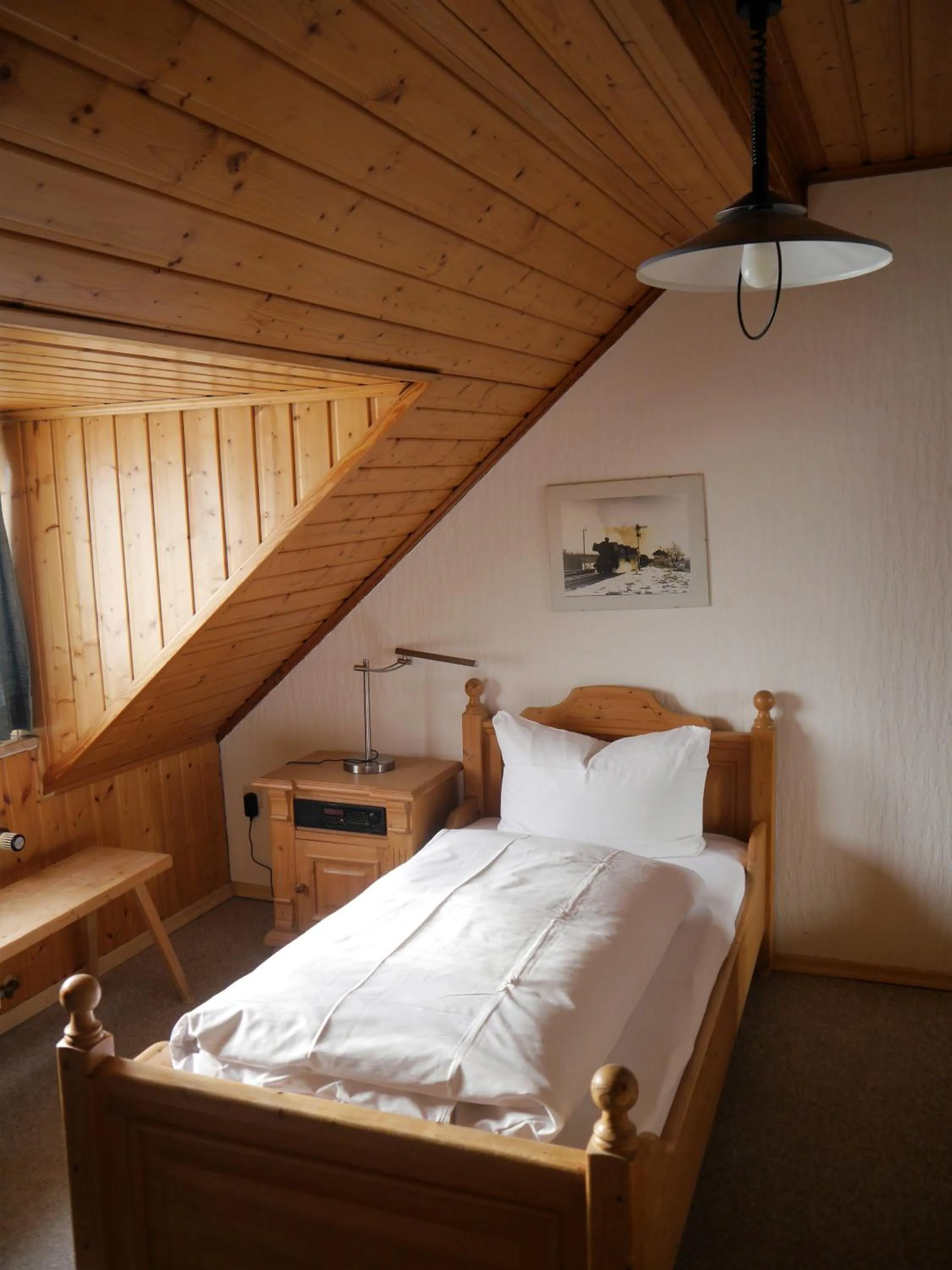 Photo of the whole room, Bed in Hotel-Gasthof-Destille-Eisenbahn