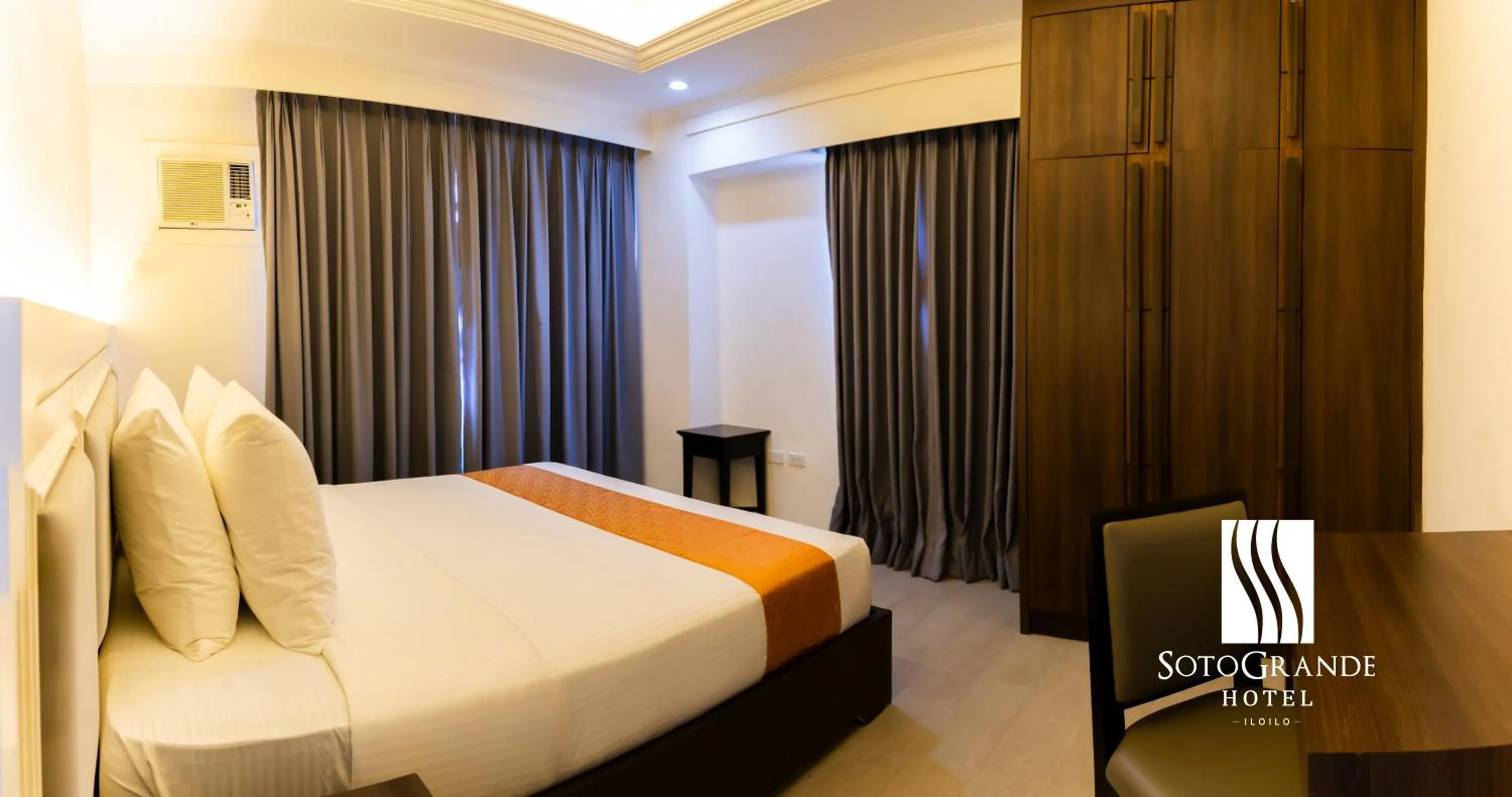 Bed in Sotogrande Iloilo Hotel