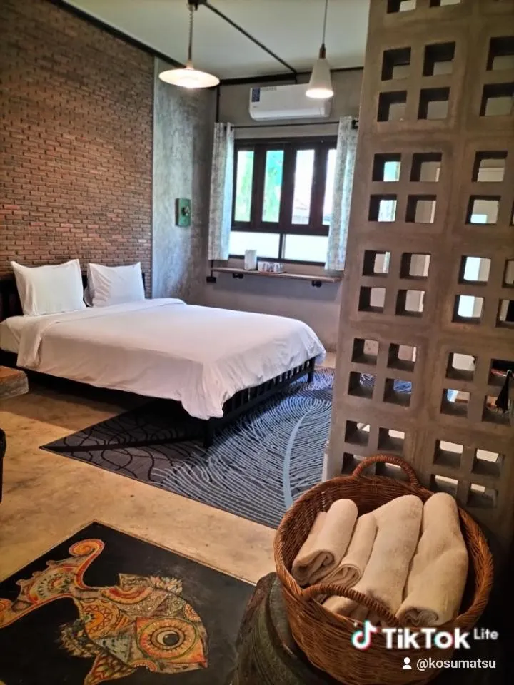 Bed in Baan Hotelier Resort