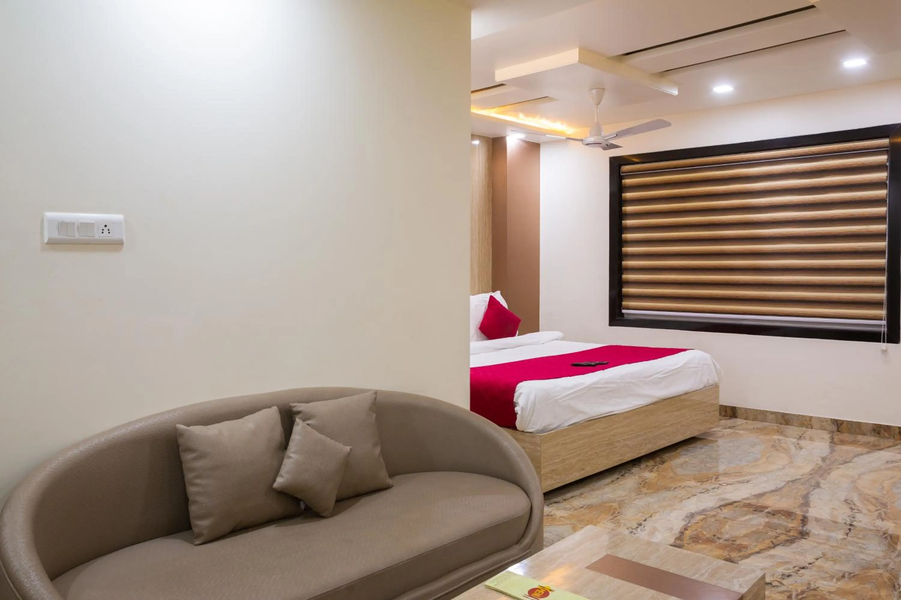 Living room, Bed in Hotel Pushkar City Inn