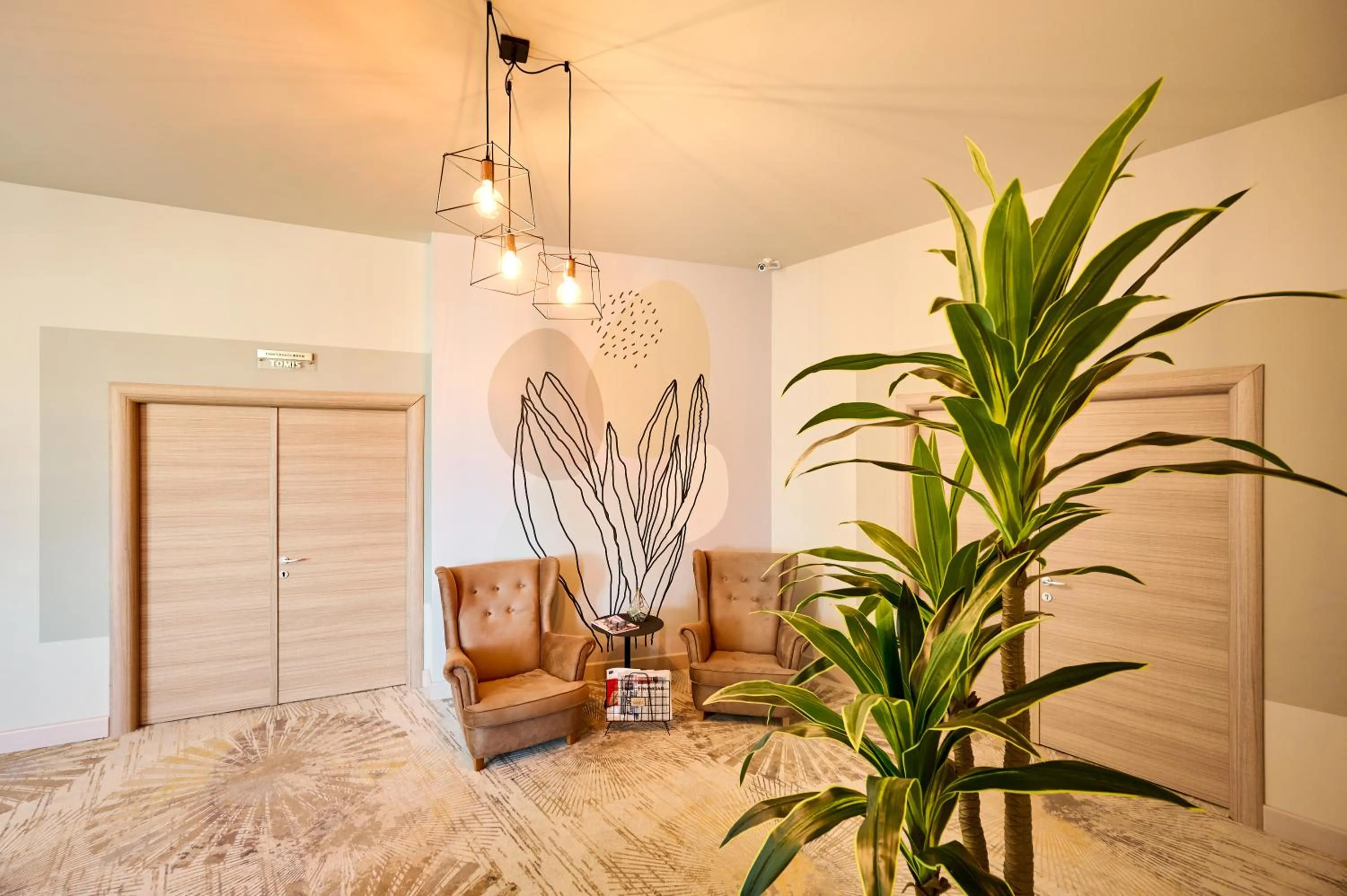 Seating area, Bed in Hotel Malibu