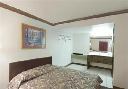 Bed in Executive Inn Muldrow