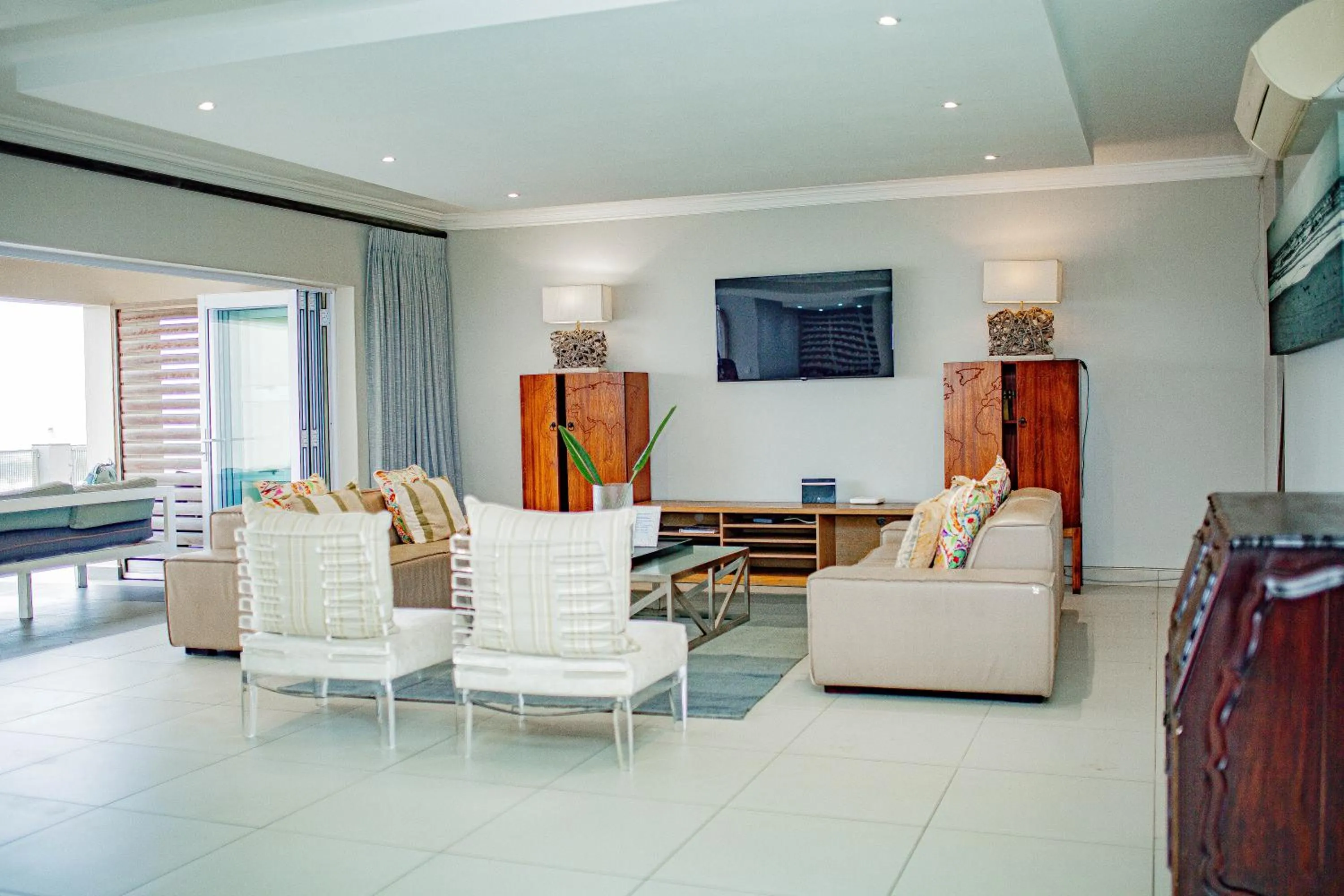 Communal lounge/ TV room in Vetho House Villa Ballito