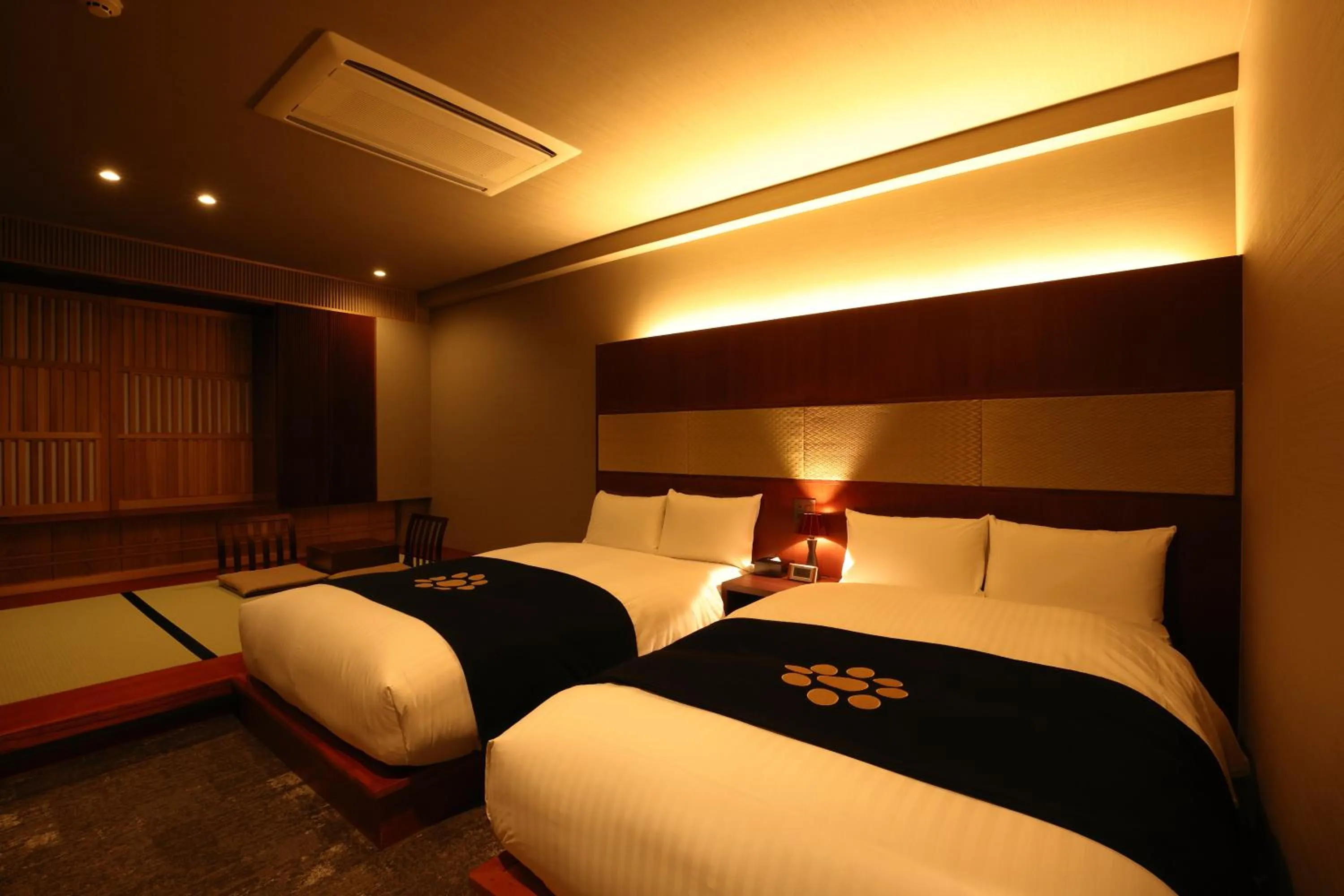 Bed in Ryotei Matsuya Honkan Suizenji