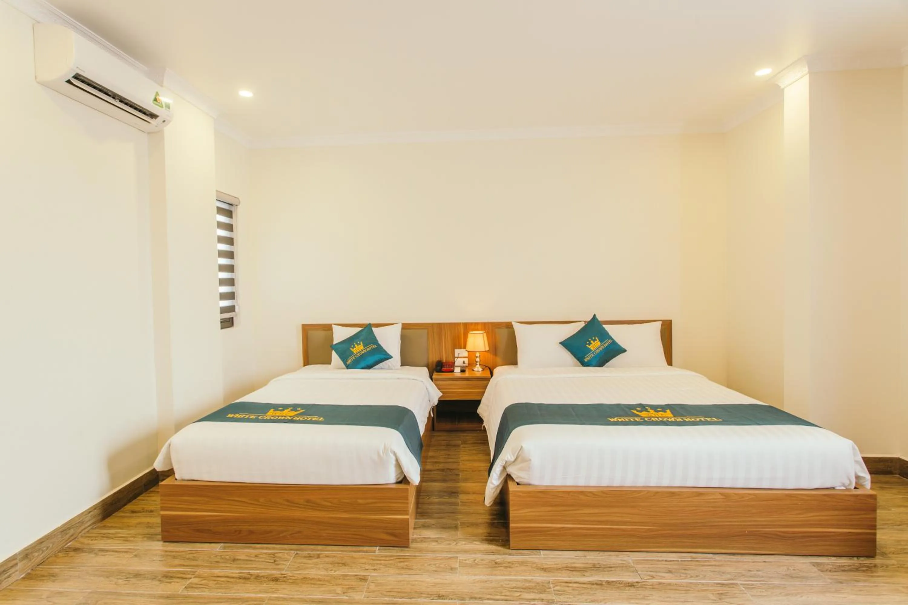 Bed in White Crown Hotel