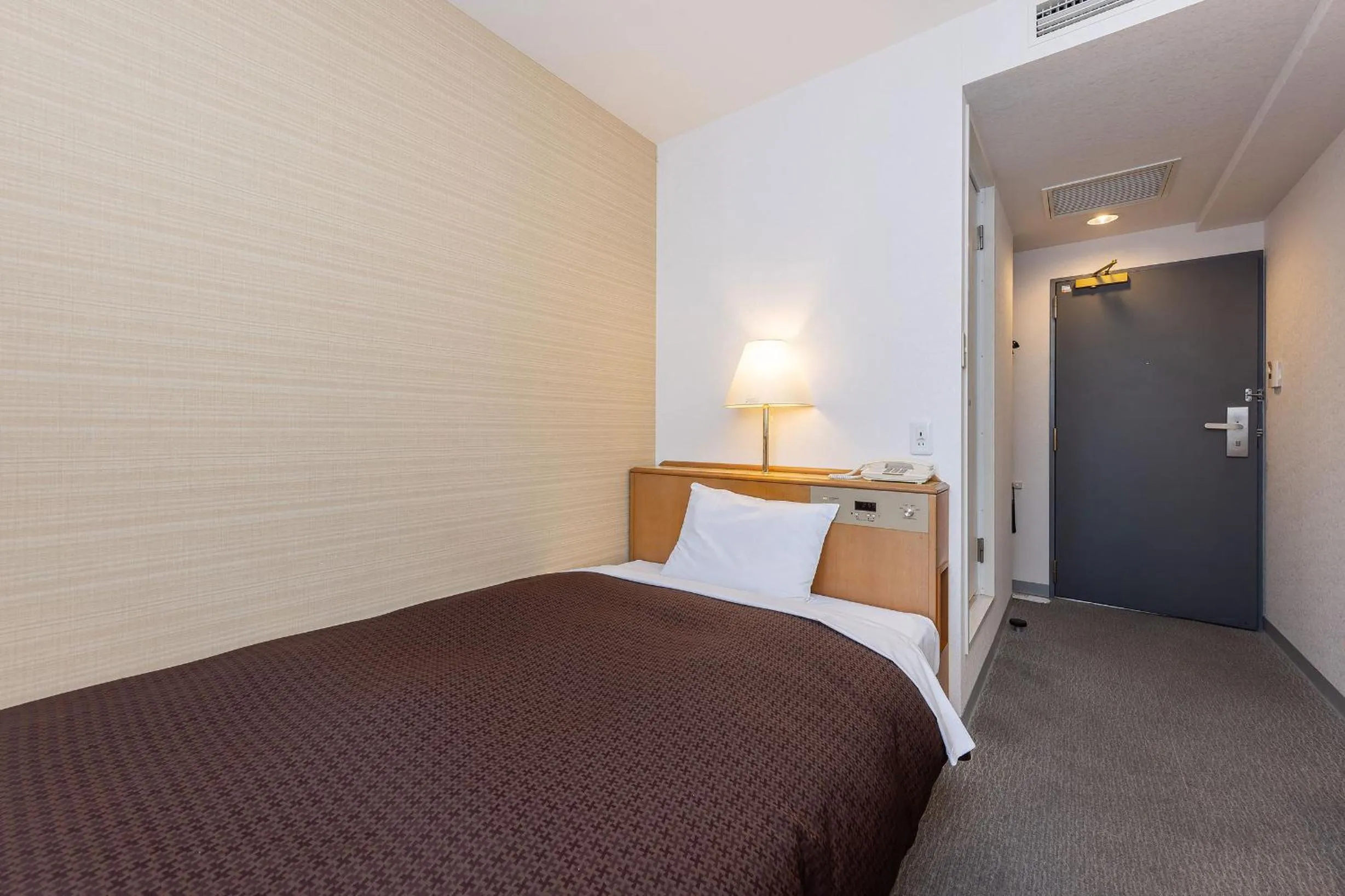 Bed in Ace Inn Matsumoto