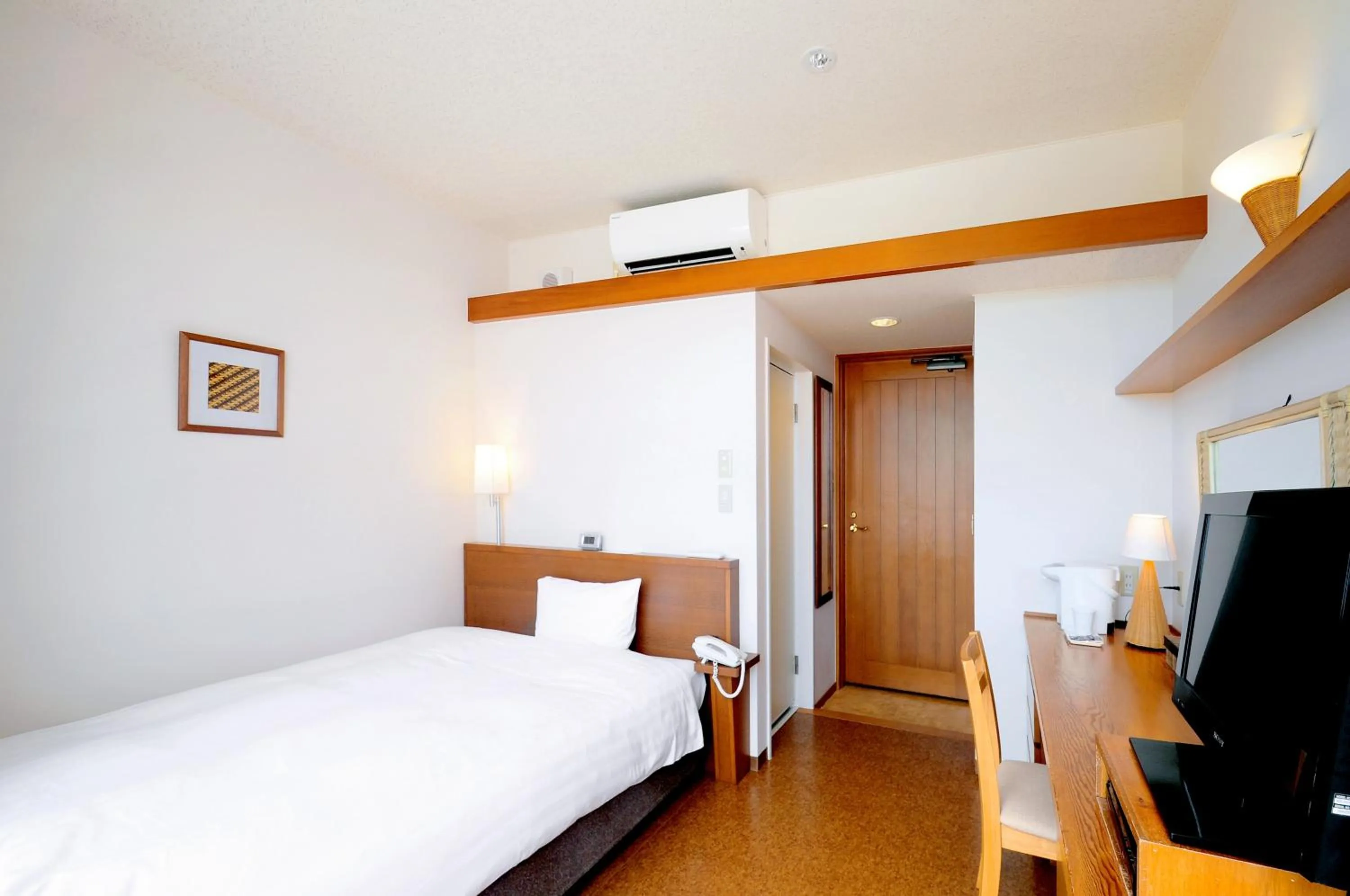 Photo of the whole room, Bed in Marine Lodge Marea