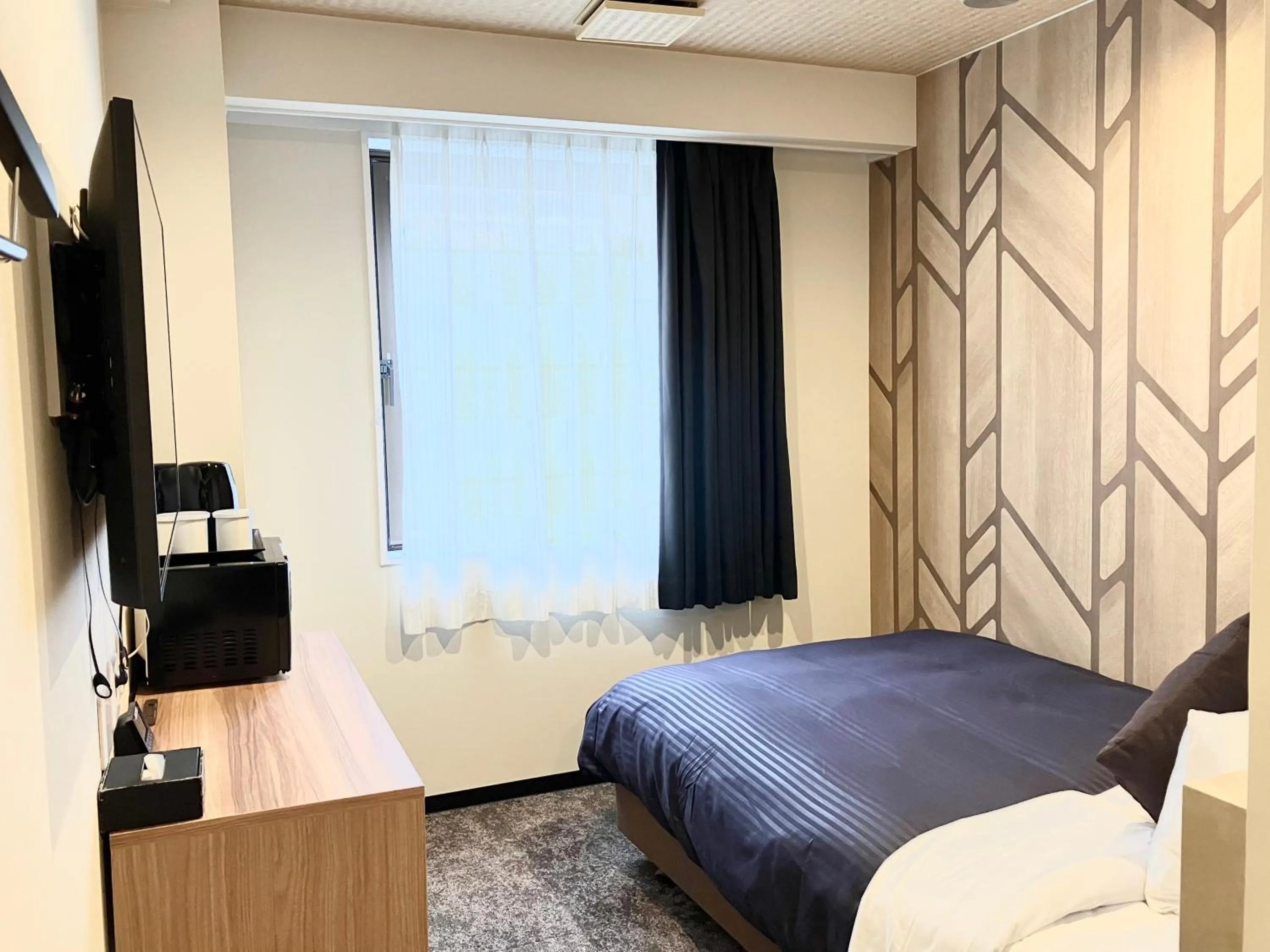 Photo of the whole room, Bed in HOTEL LiVEMAX BUDGET Chofu-Ekimae