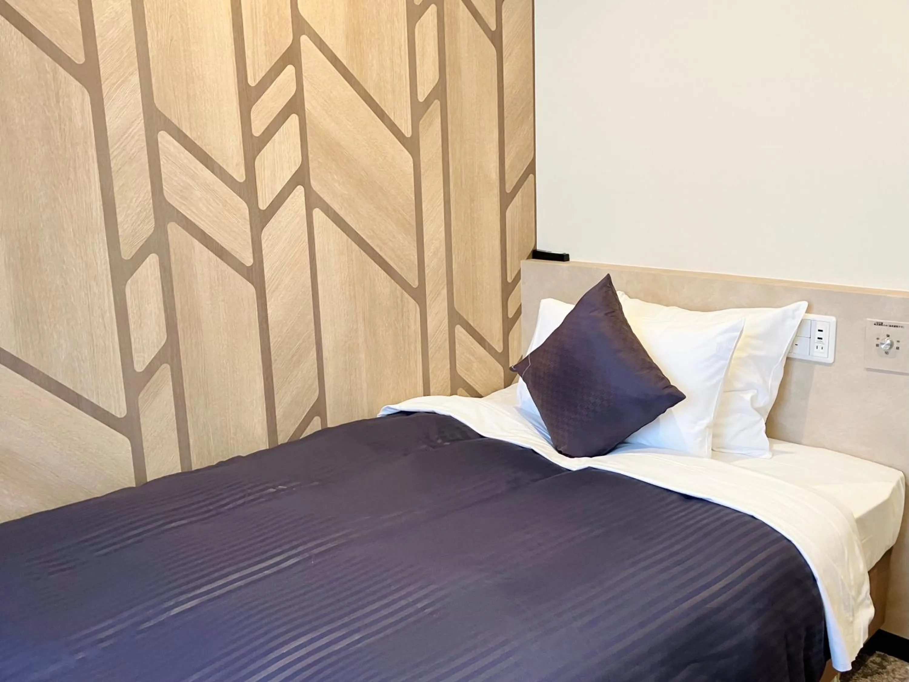 Bed in HOTEL LiVEMAX BUDGET Chofu-Ekimae