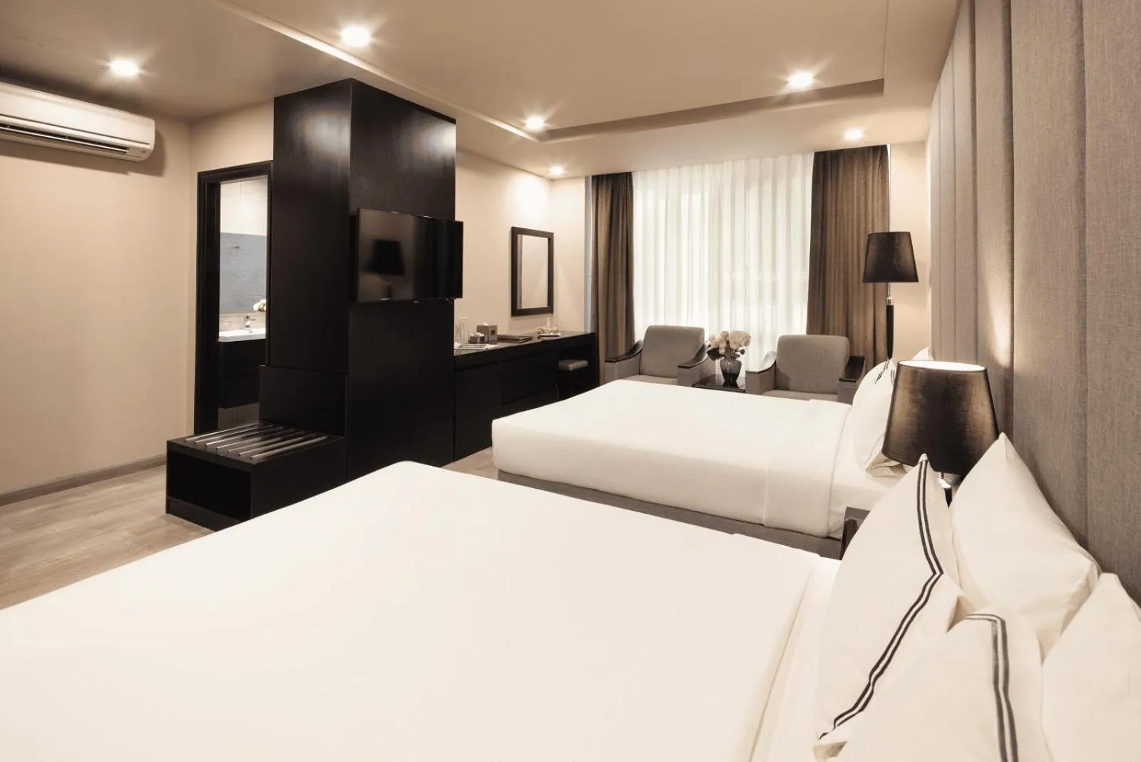 Bed in Paragon Saigon Hotel