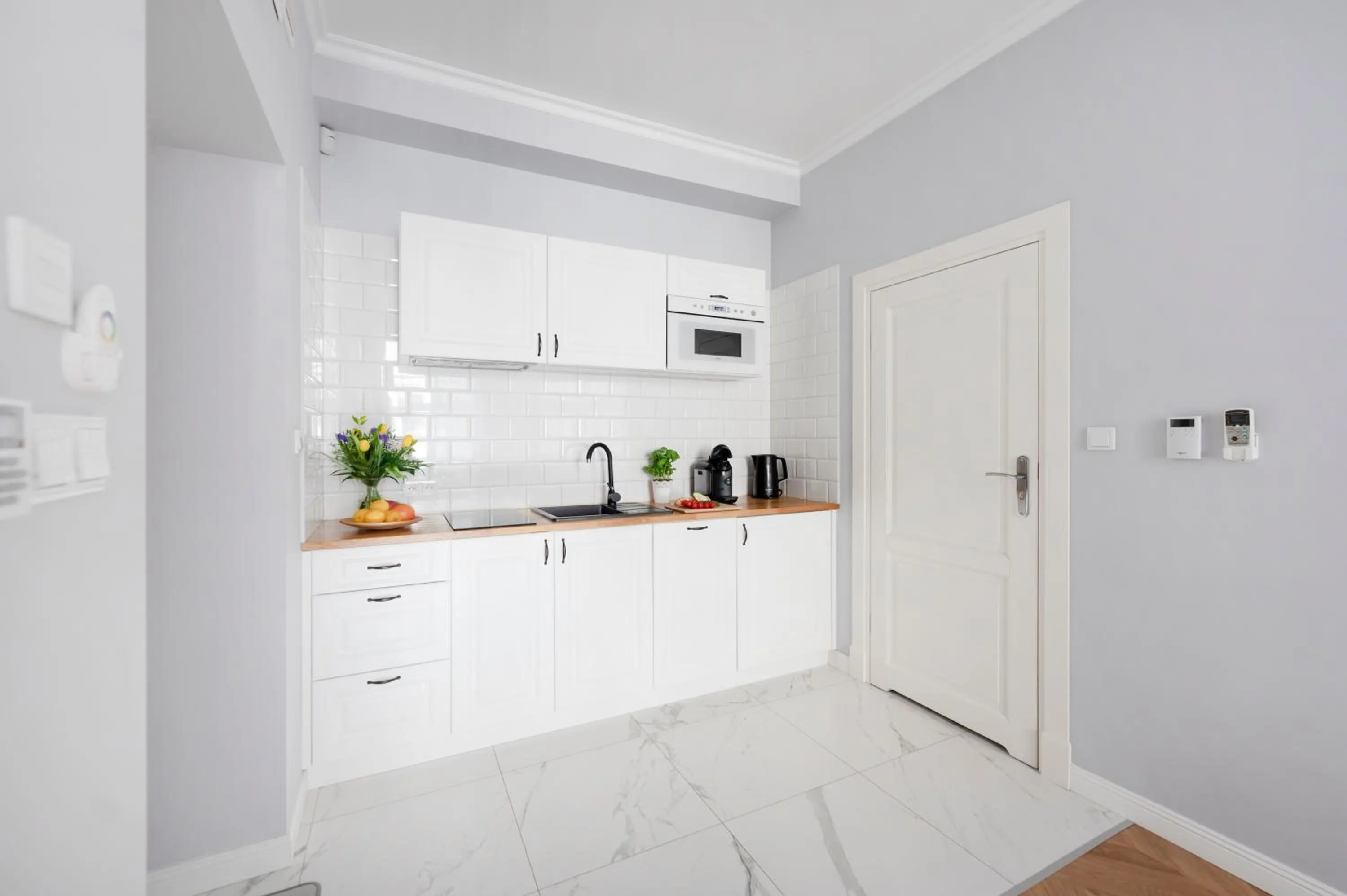 Kitchen or kitchenette in Main Square Apartments