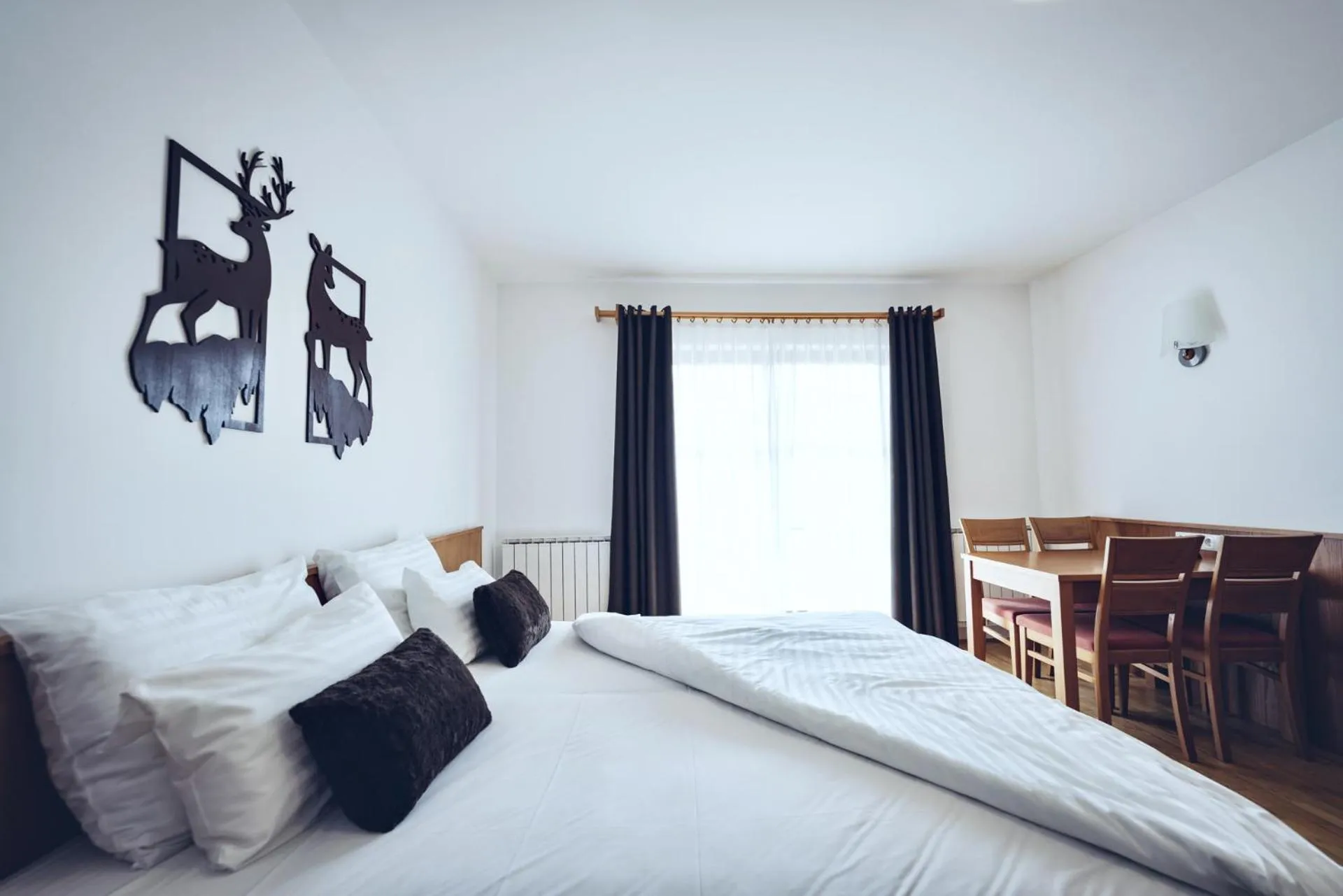 Bed in Pohorje Village Wellbeing Resort - Wellness & Spa Hotel Bolfenk