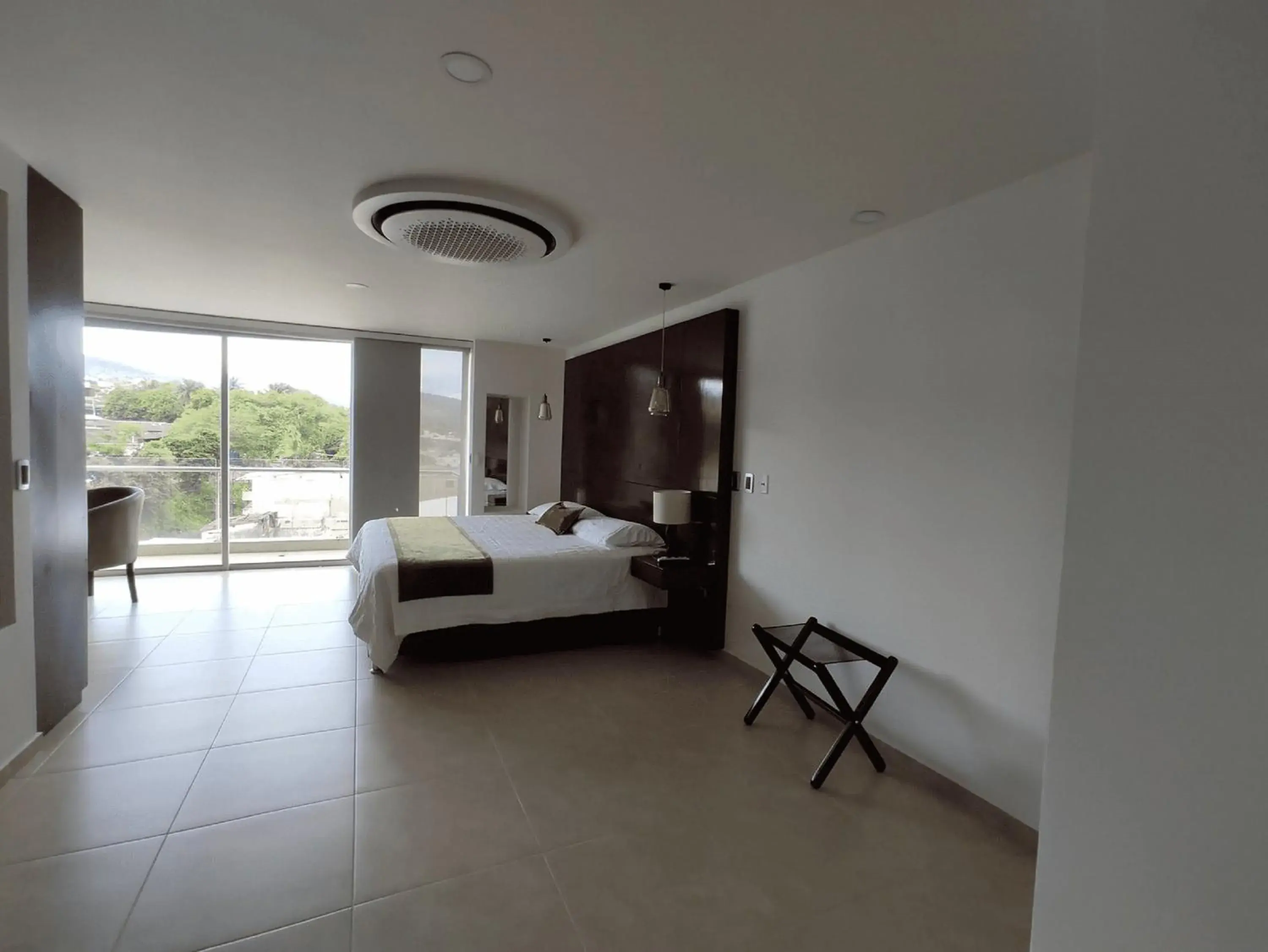 Superior Queen Room in Hotel Andinos Plaza Florencia Superior Queen Room in Hotel Andinos Plaza Florencia