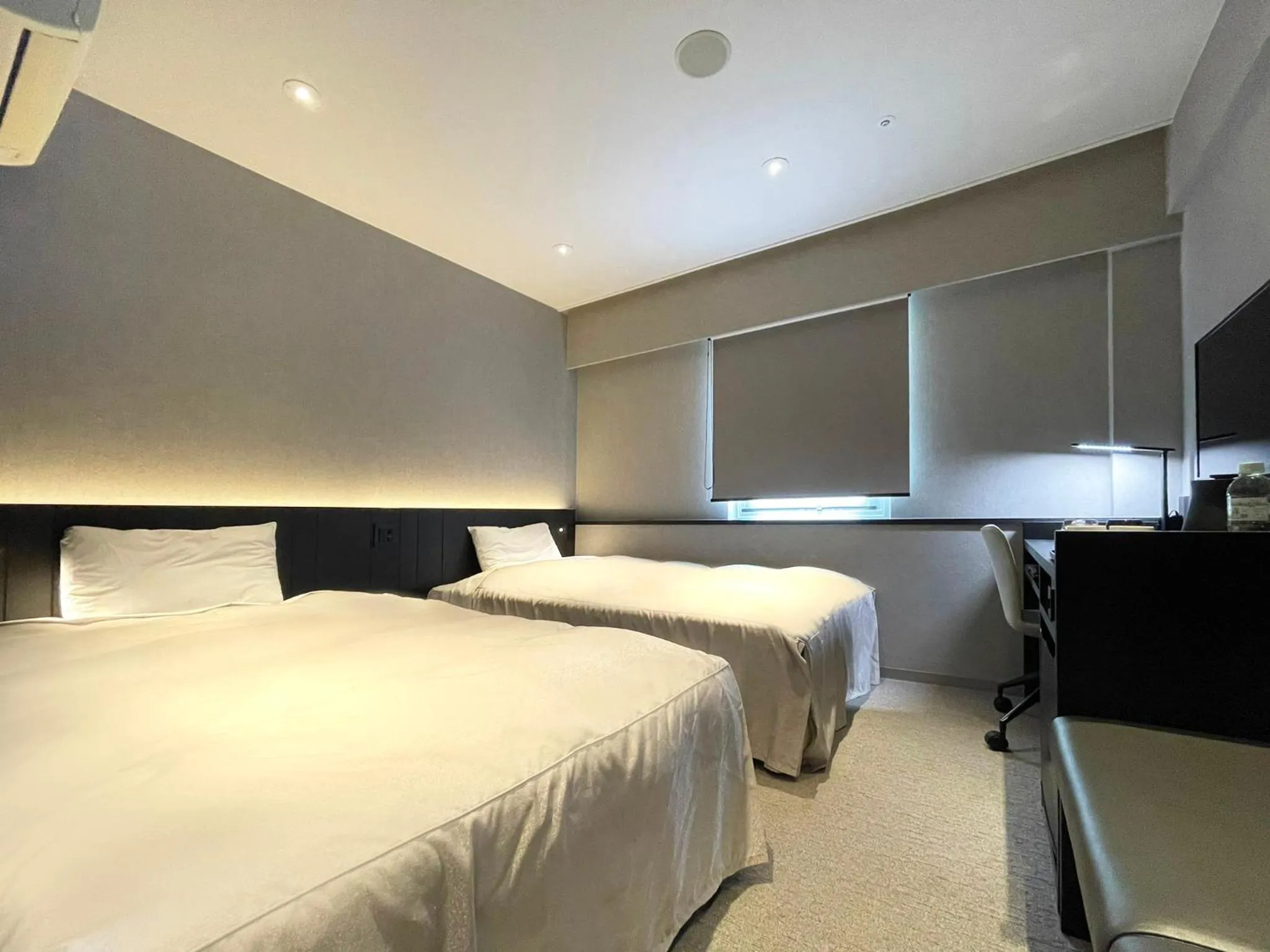 Bed in Hotel Sunroute Kumamoto