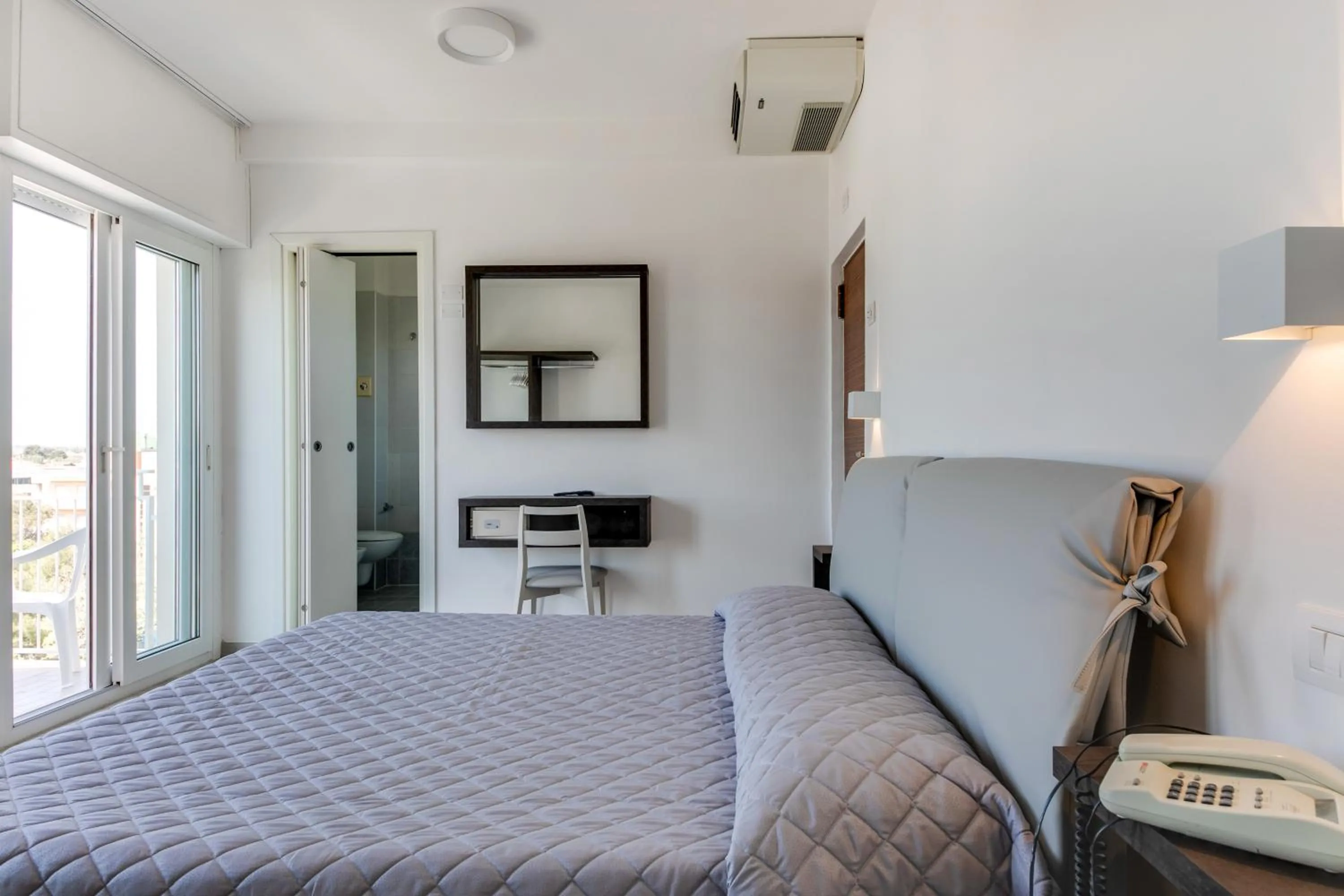 Photo of the whole room, Bed in MARITTIMO Riccione - Hotel Clipper FRONTE MARE