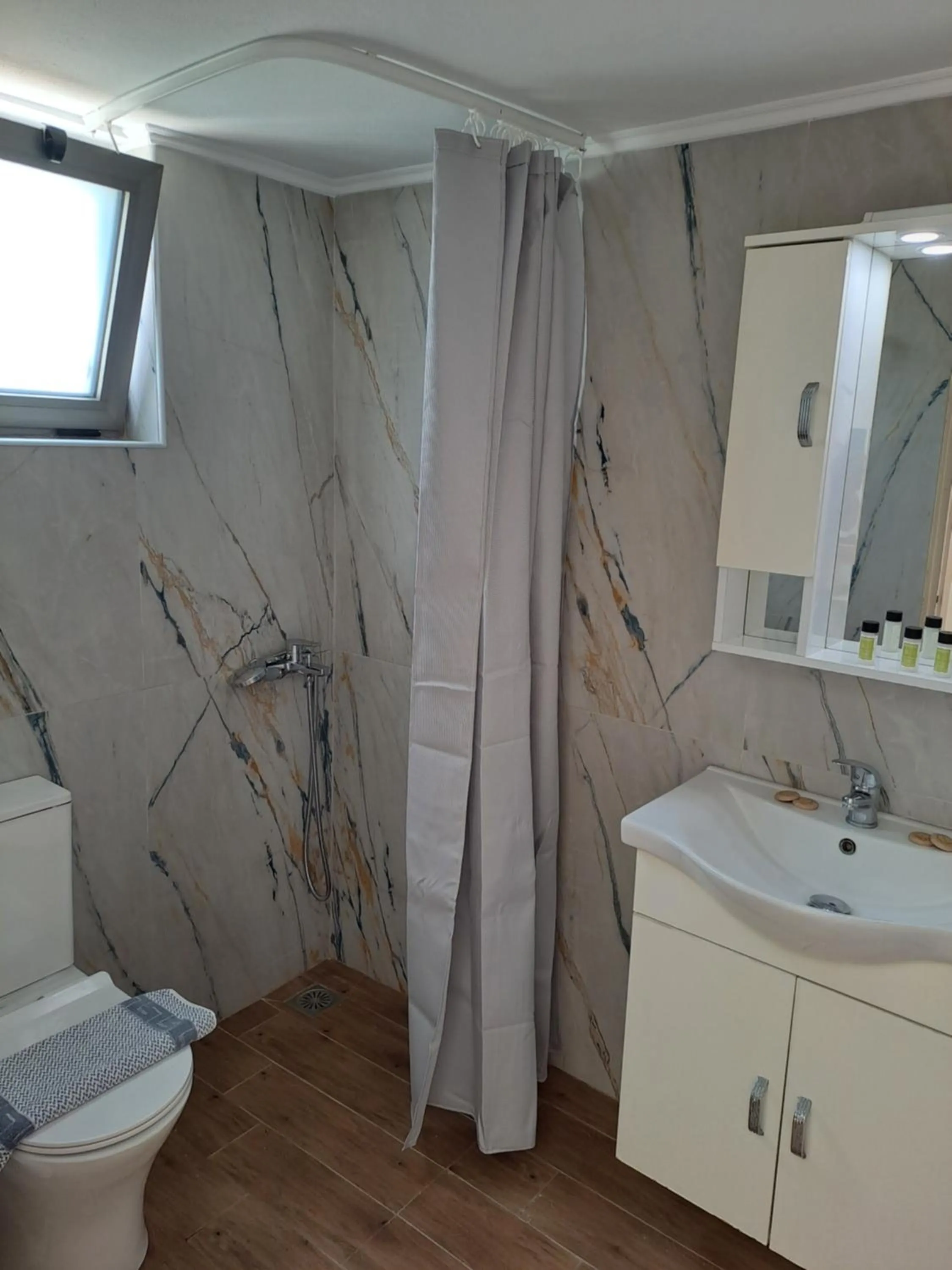 Shower in Almyra Apartments & Suites