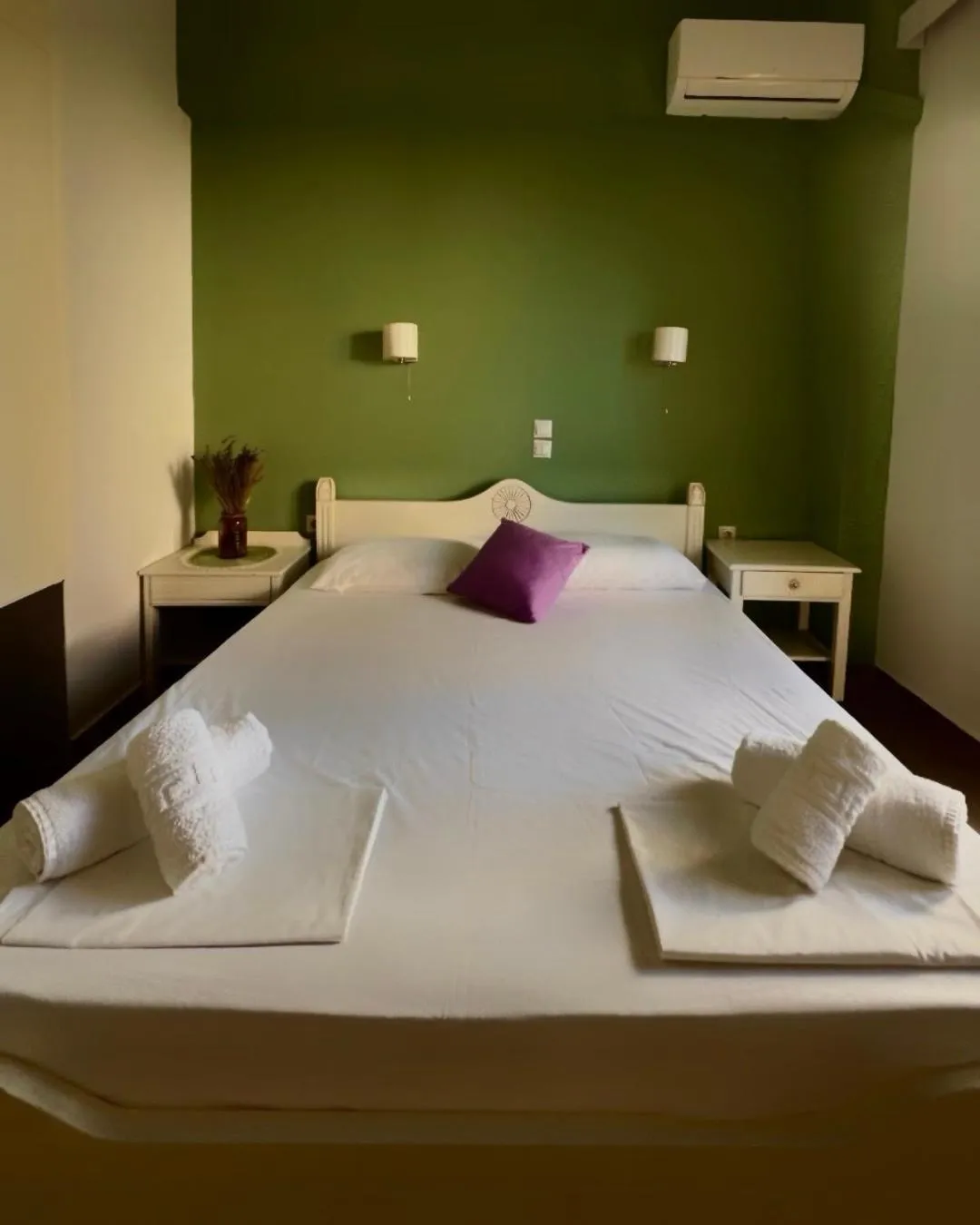 Bed in Almyra Apartments & Suites