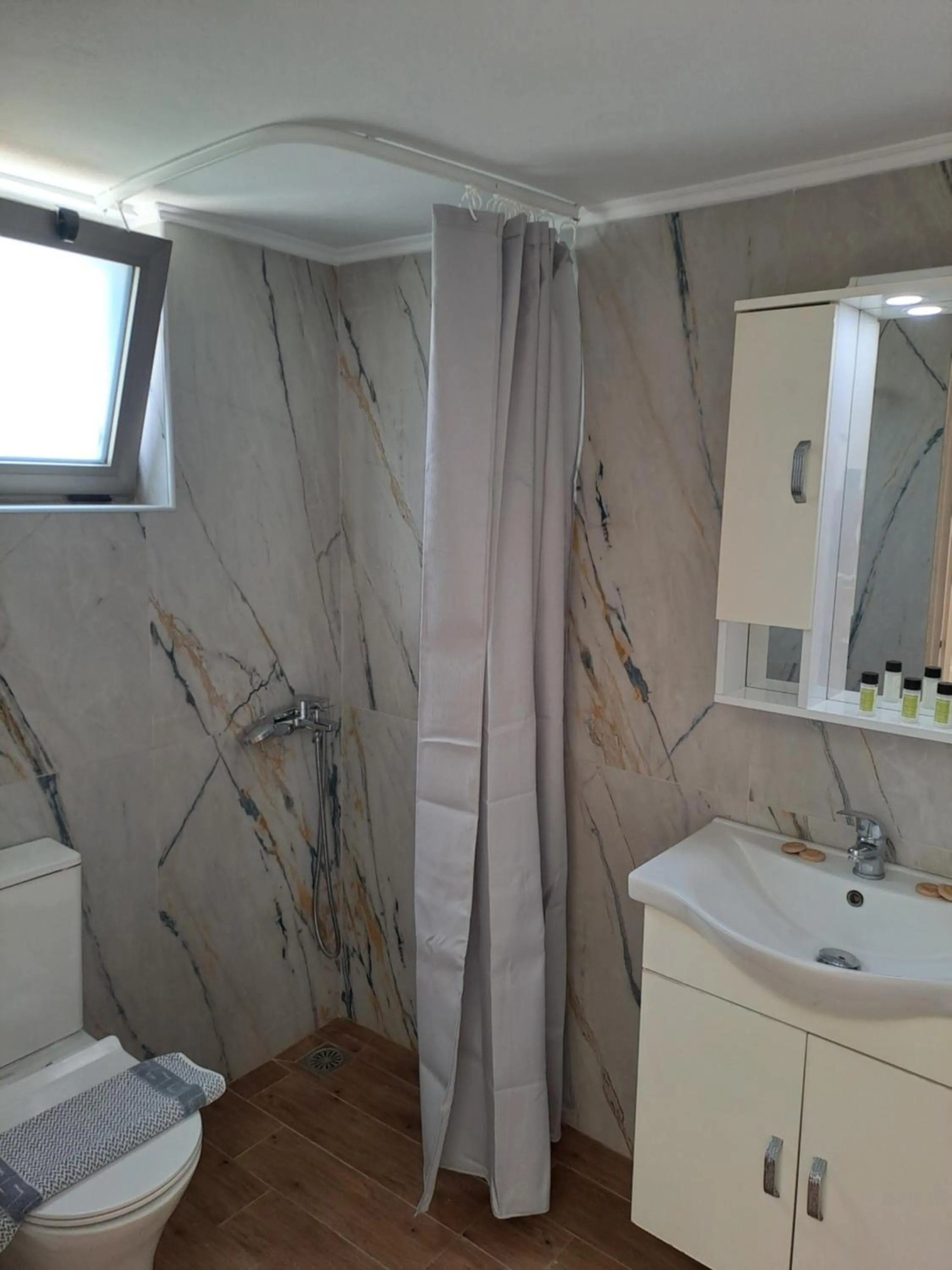 Shower in Almyra Apartments & Suites