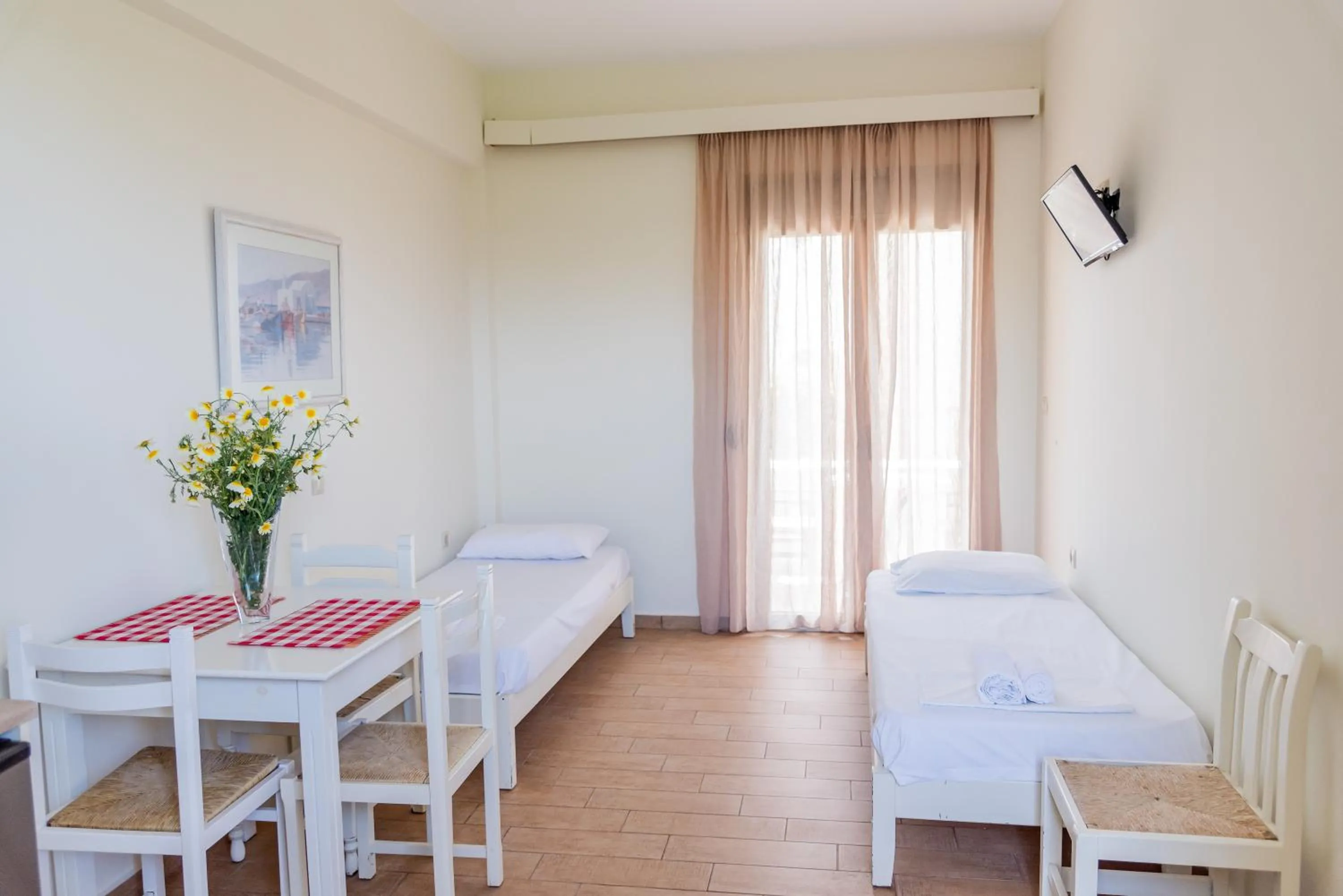 Living room, Bed in Almyra Apartments & Suites