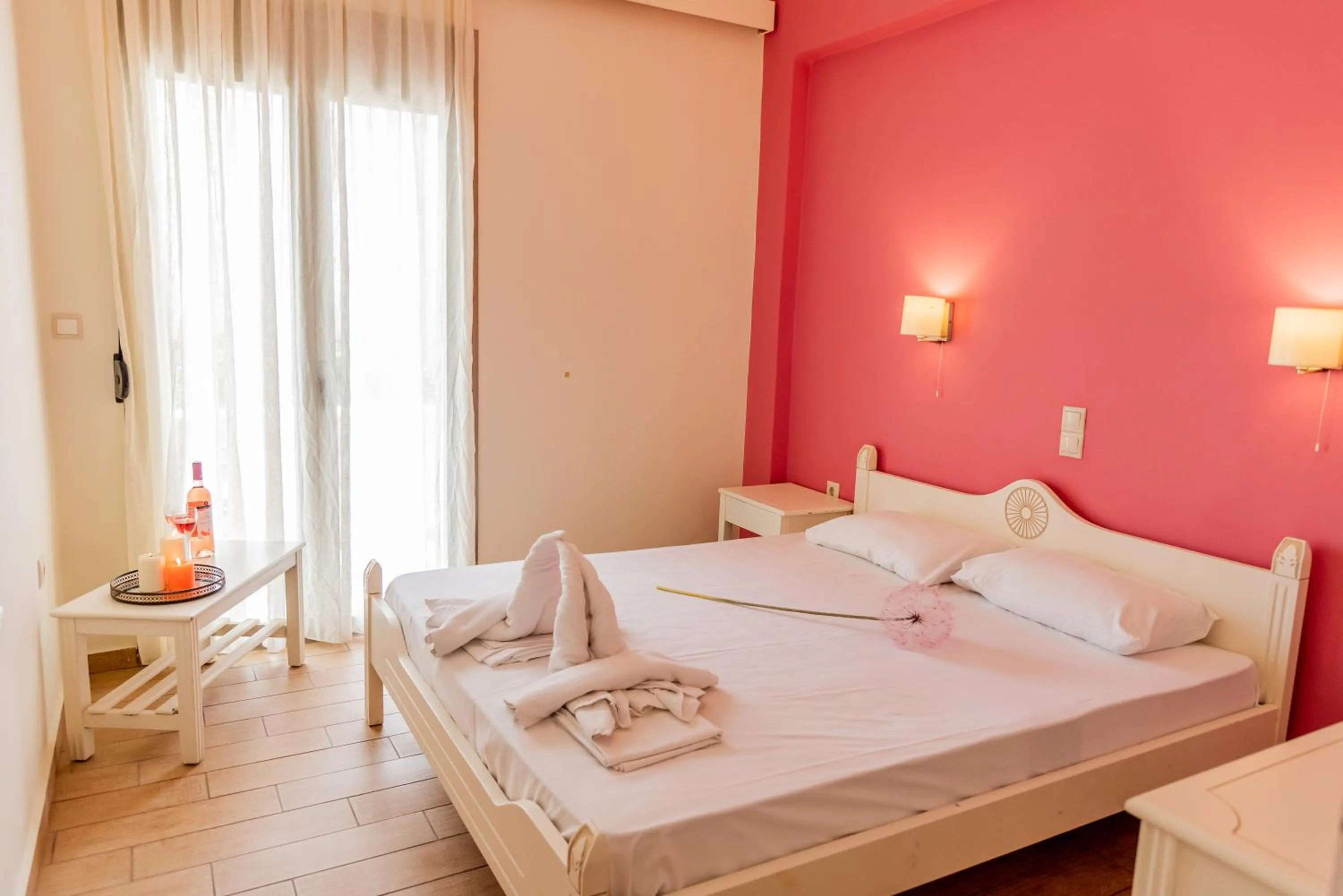 Bed in Almyra Apartments & Suites