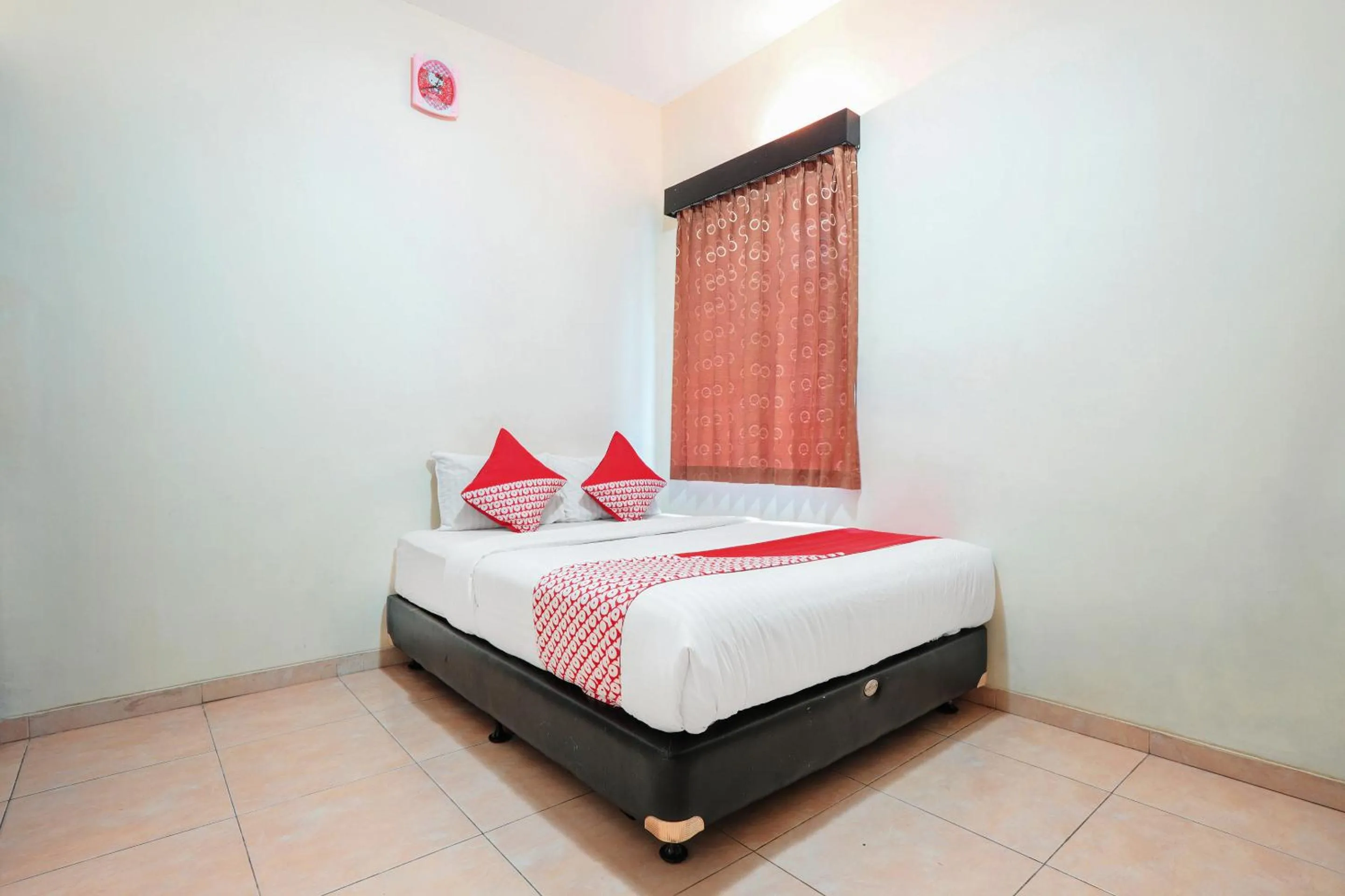 Bedroom in OYO 122 Oekude Kost