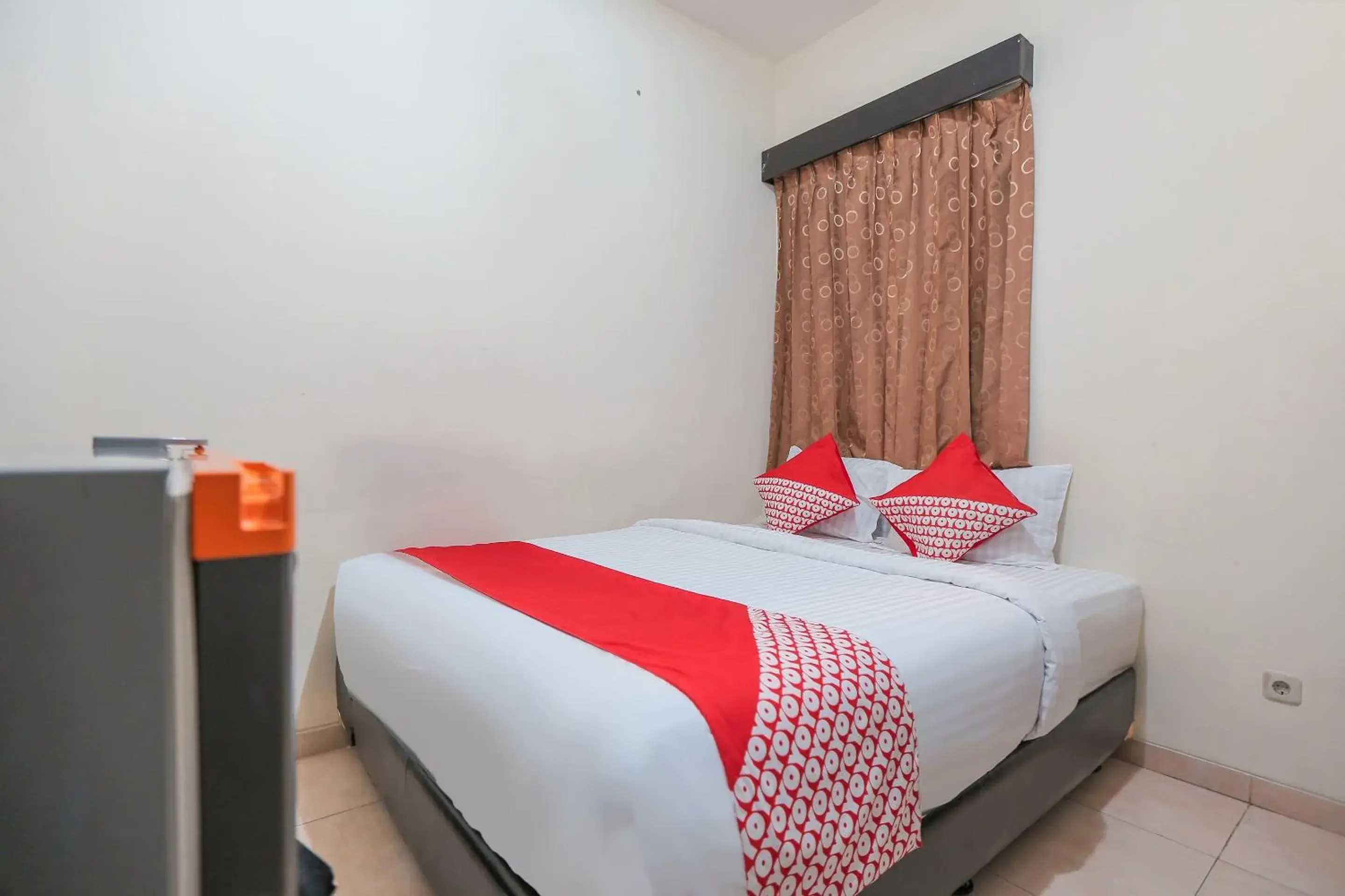 Bedroom in OYO 122 Oekude Kost Bedroom in OYO 122 Oekude Kost