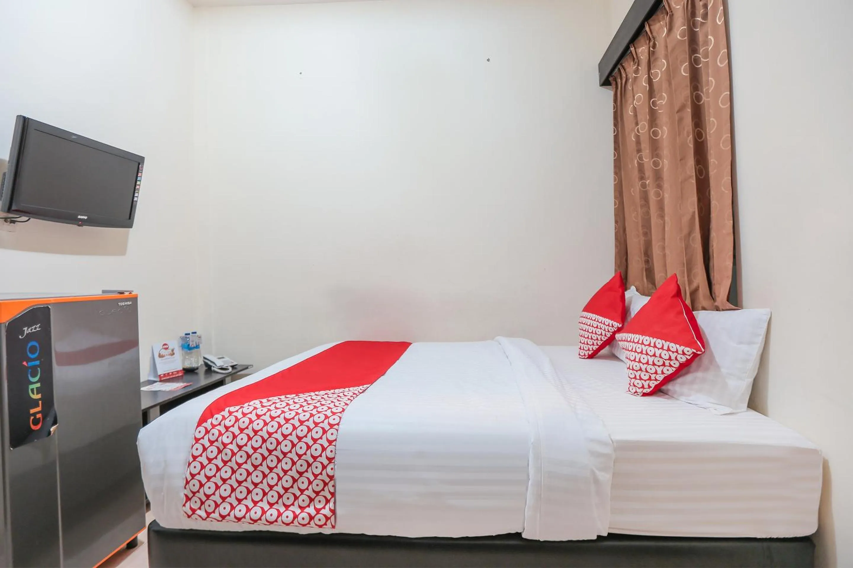 Bedroom in OYO 122 Oekude Kost