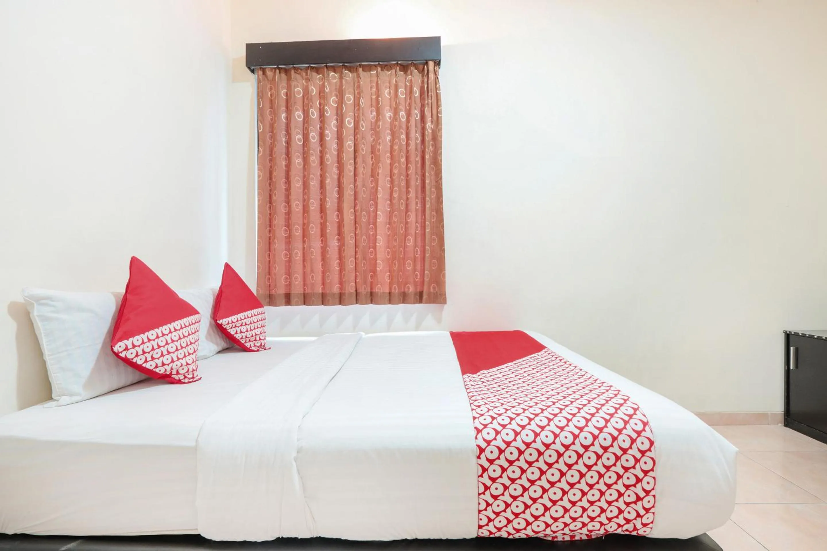 Bedroom in OYO 122 Oekude Kost