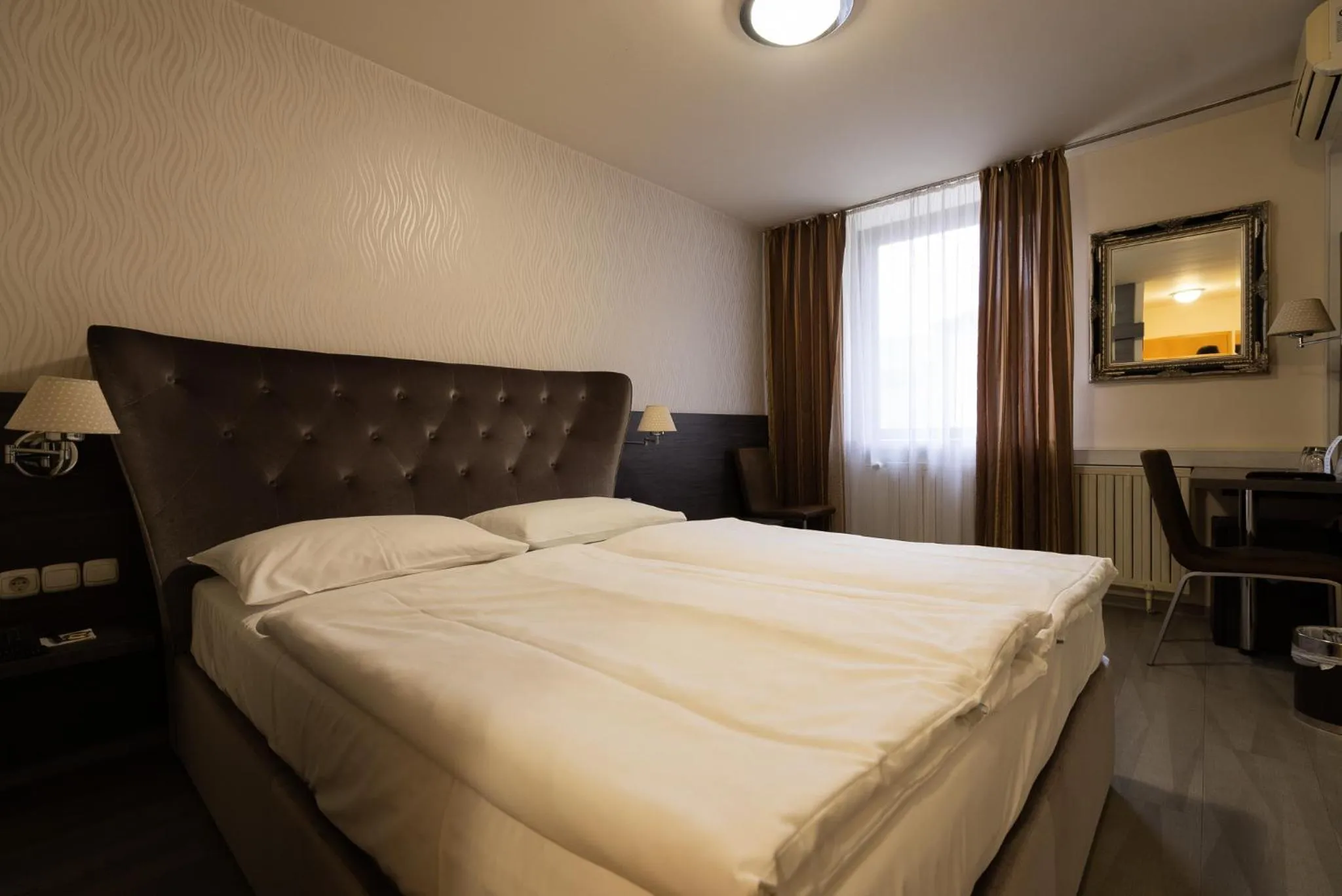 Bed in Hotel Evropa