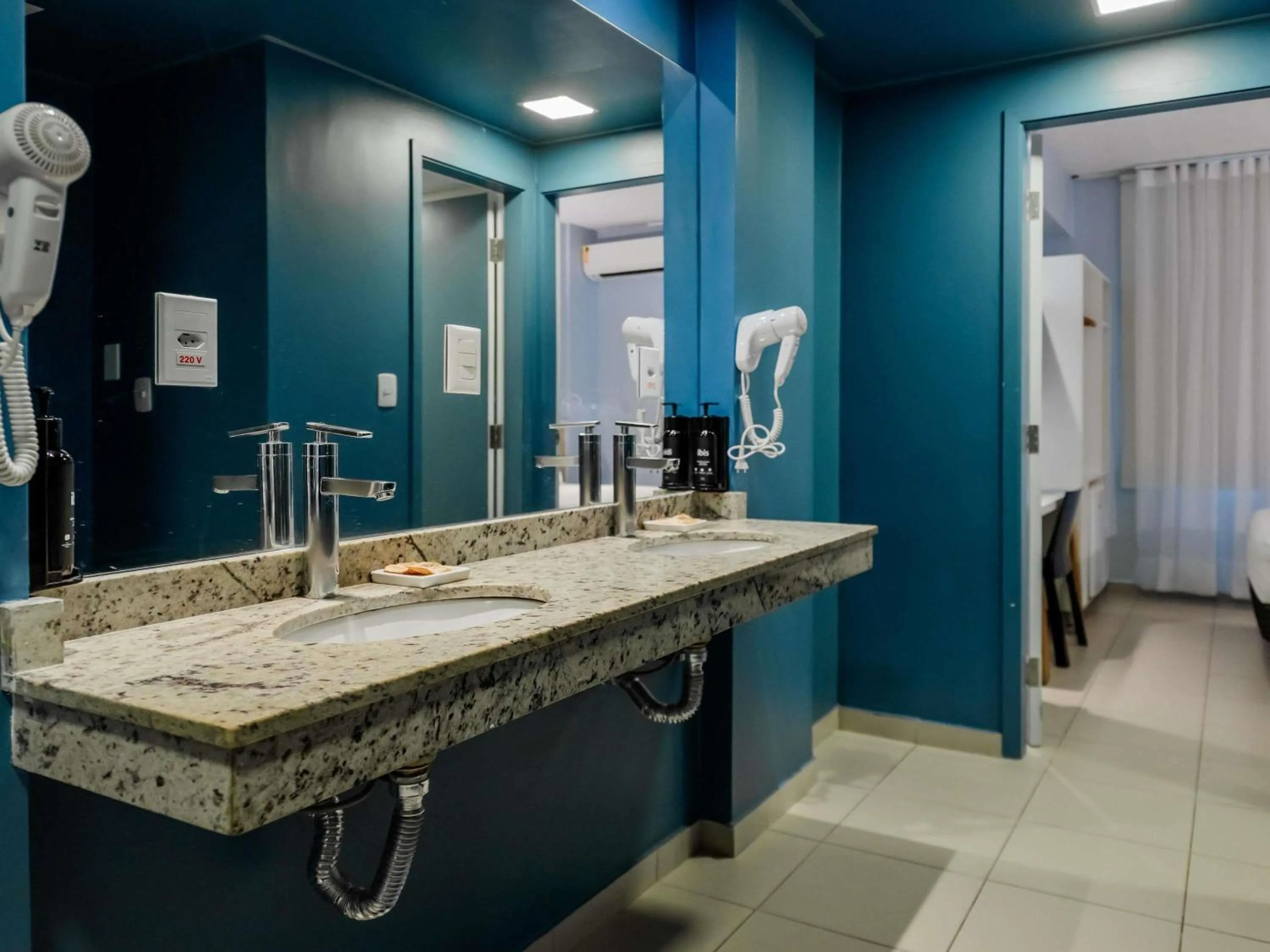 Bedroom in ibis Styles Manaus