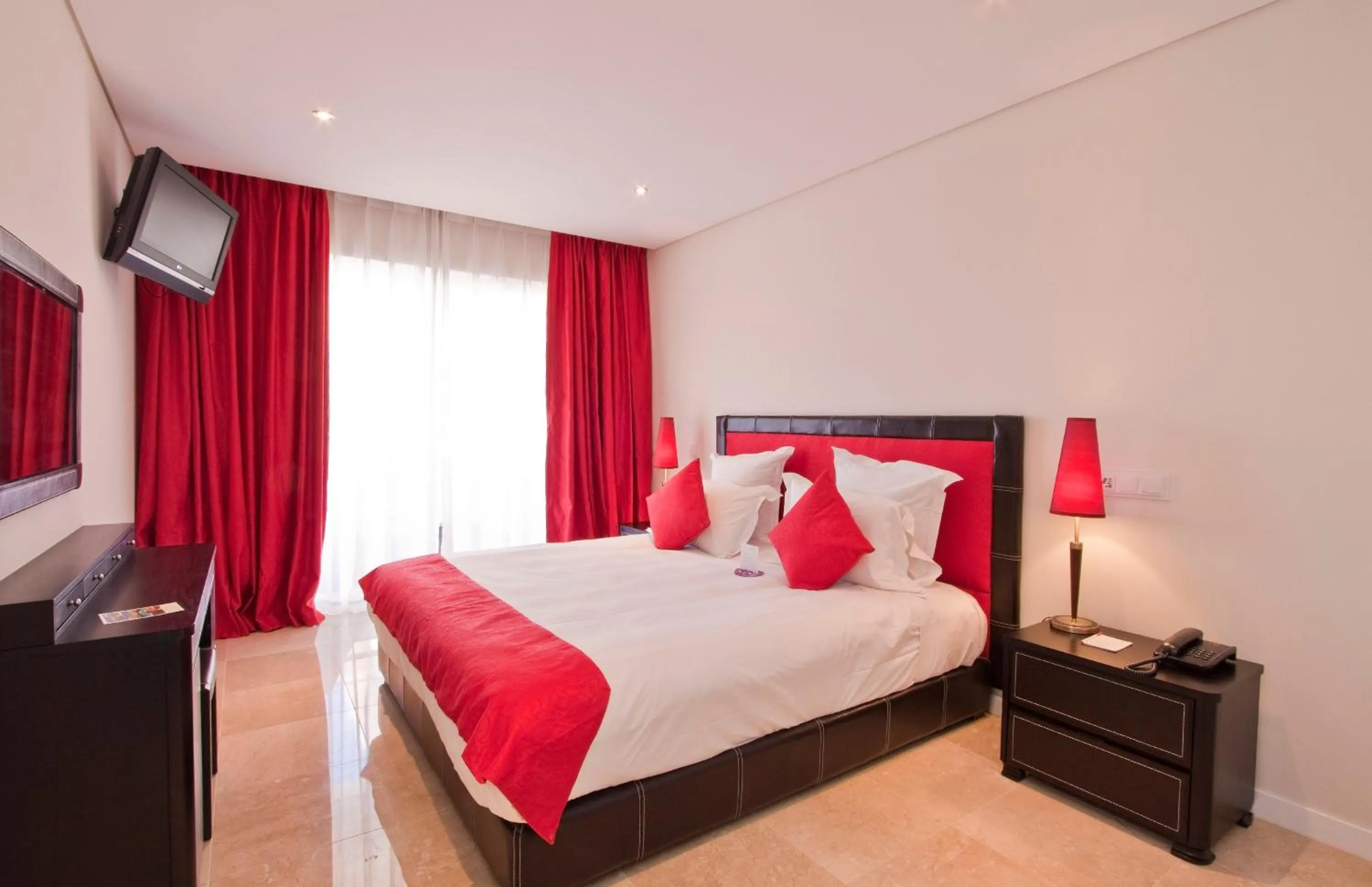 Bed in As Cascatas Golf Resort & Spa