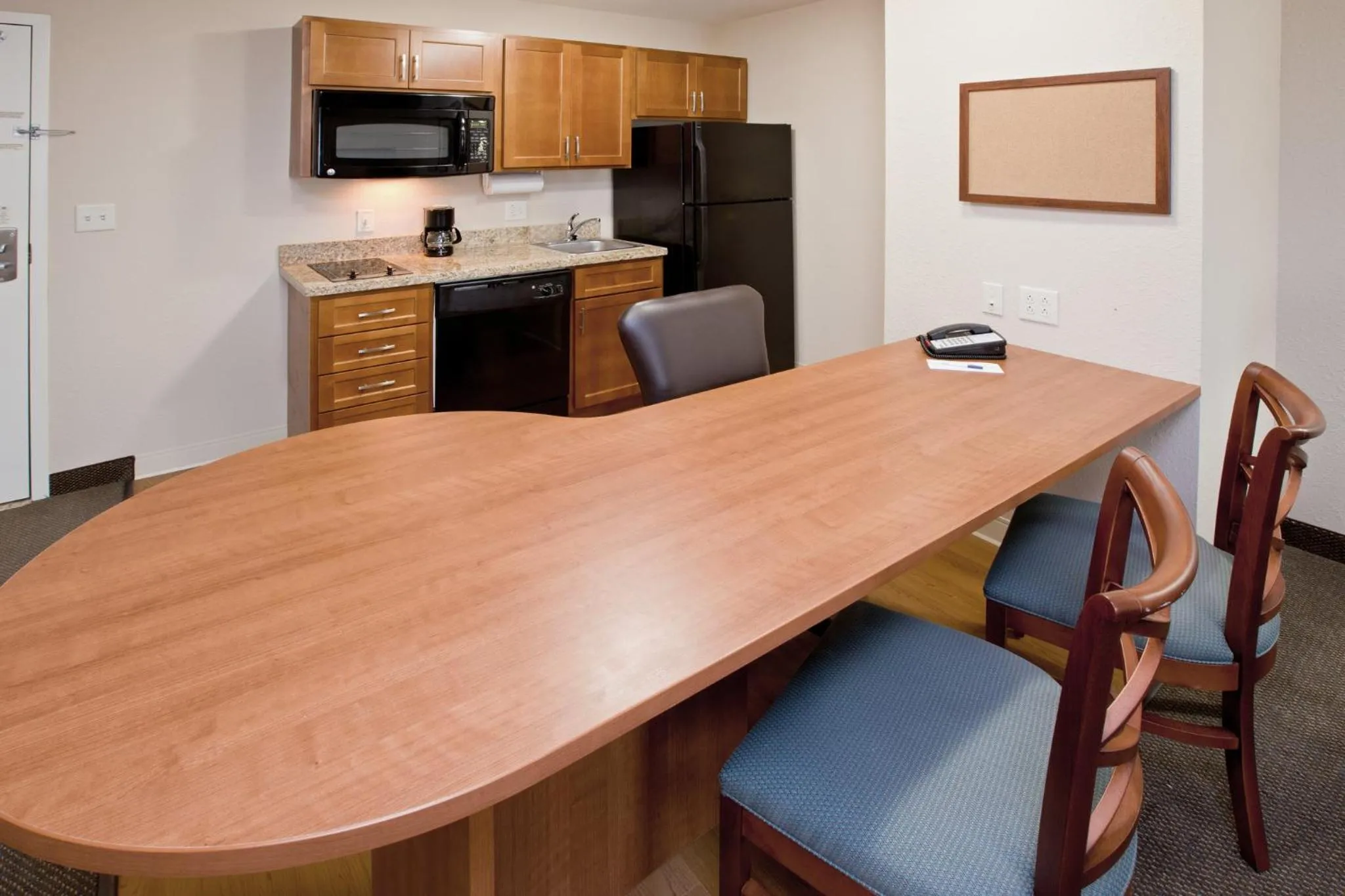 Photo of the whole room in Candlewood Suites Indianapolis East by IHG