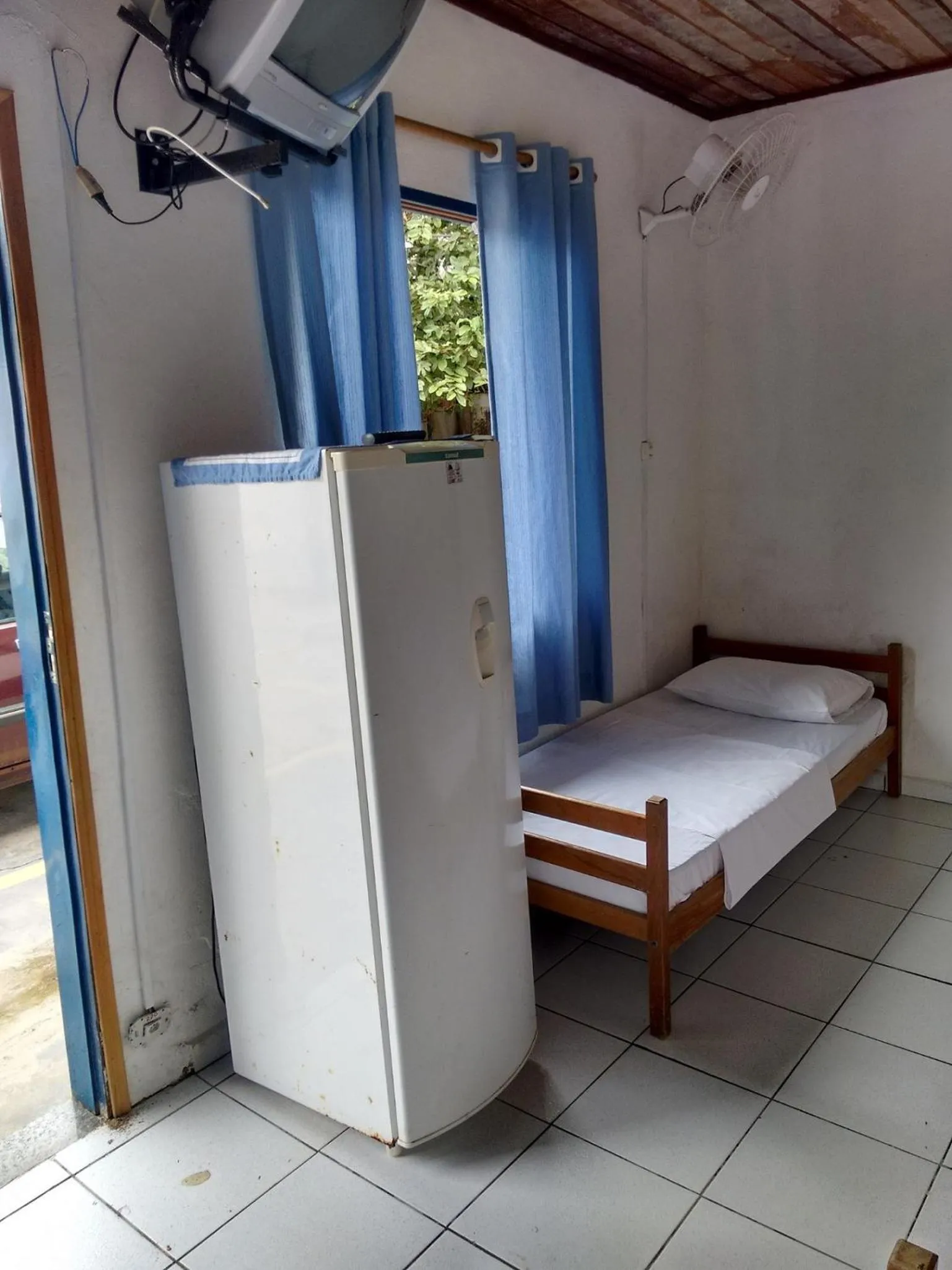 Bed in Pousada Edson