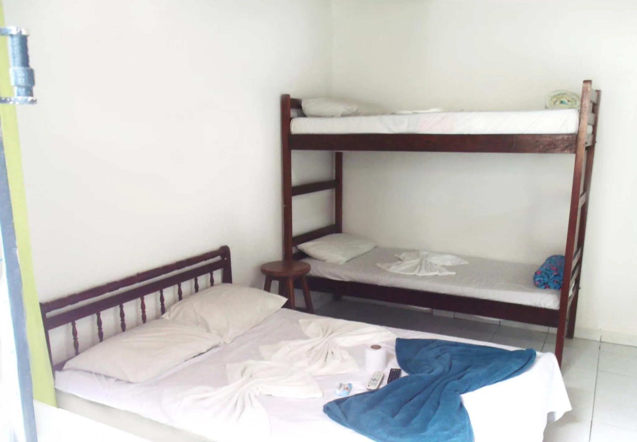 Bed in Pousada Edson